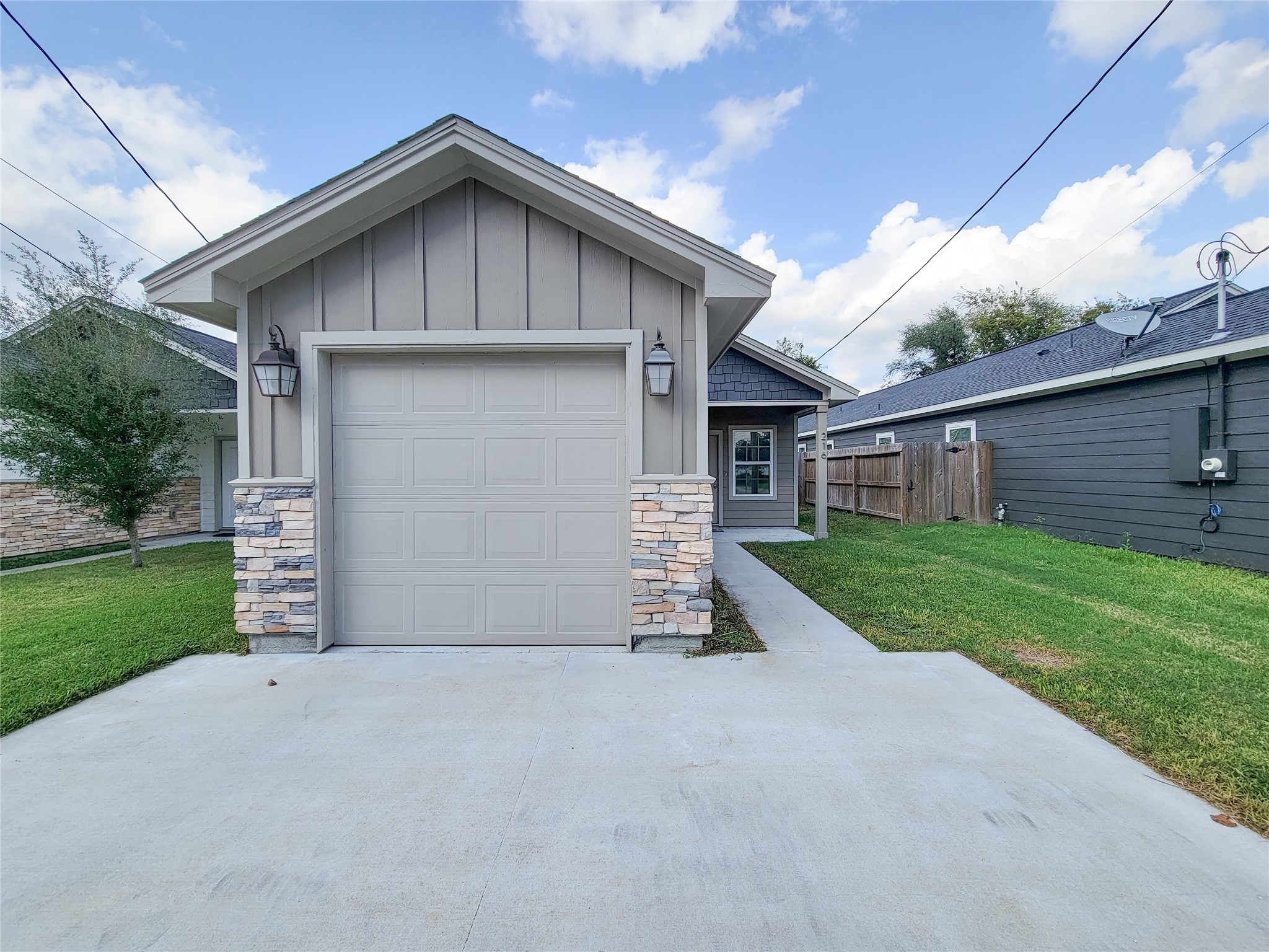 216 West Live Oak Street Angleton, TX 77515 - Photo 2 of 40 a view of a house with a yard