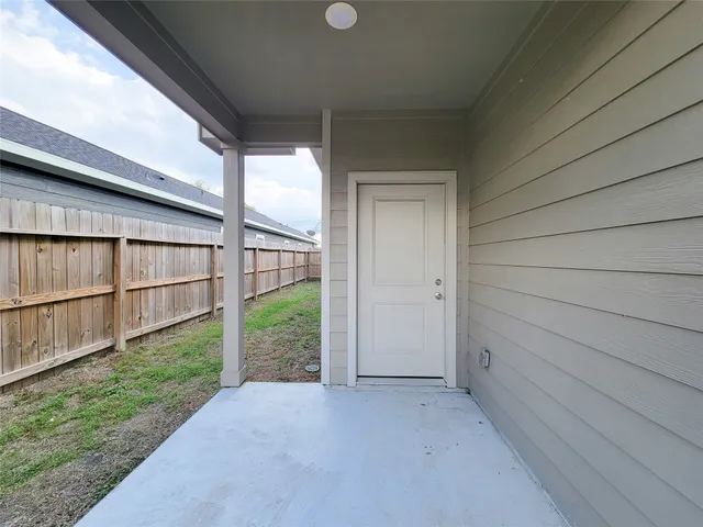 a view of a house with a yard and garage