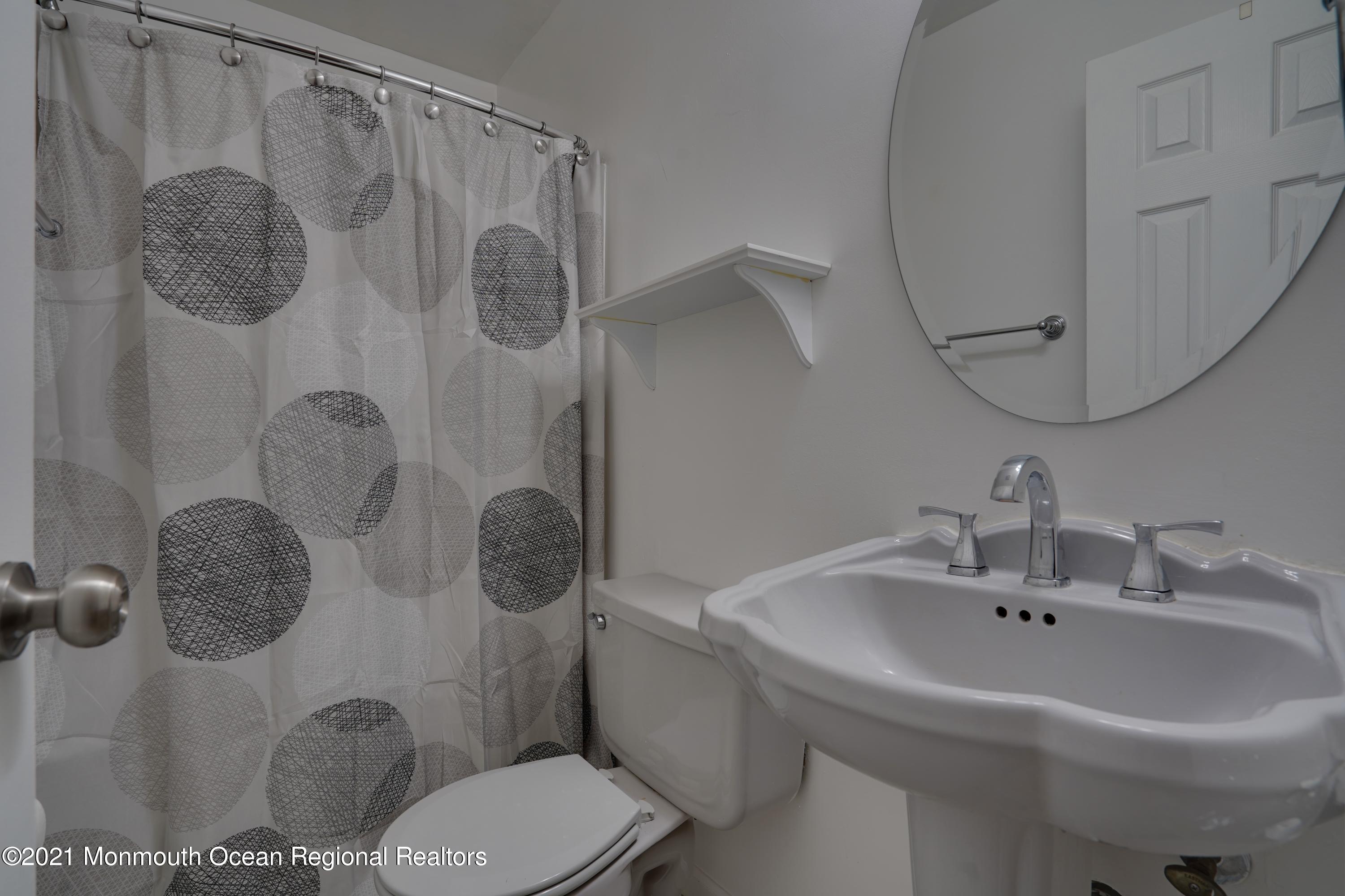 217 County Road Cliffwood, NJ 07721 - Photo 22 of 27 a bathroom with a sink toilet and shower