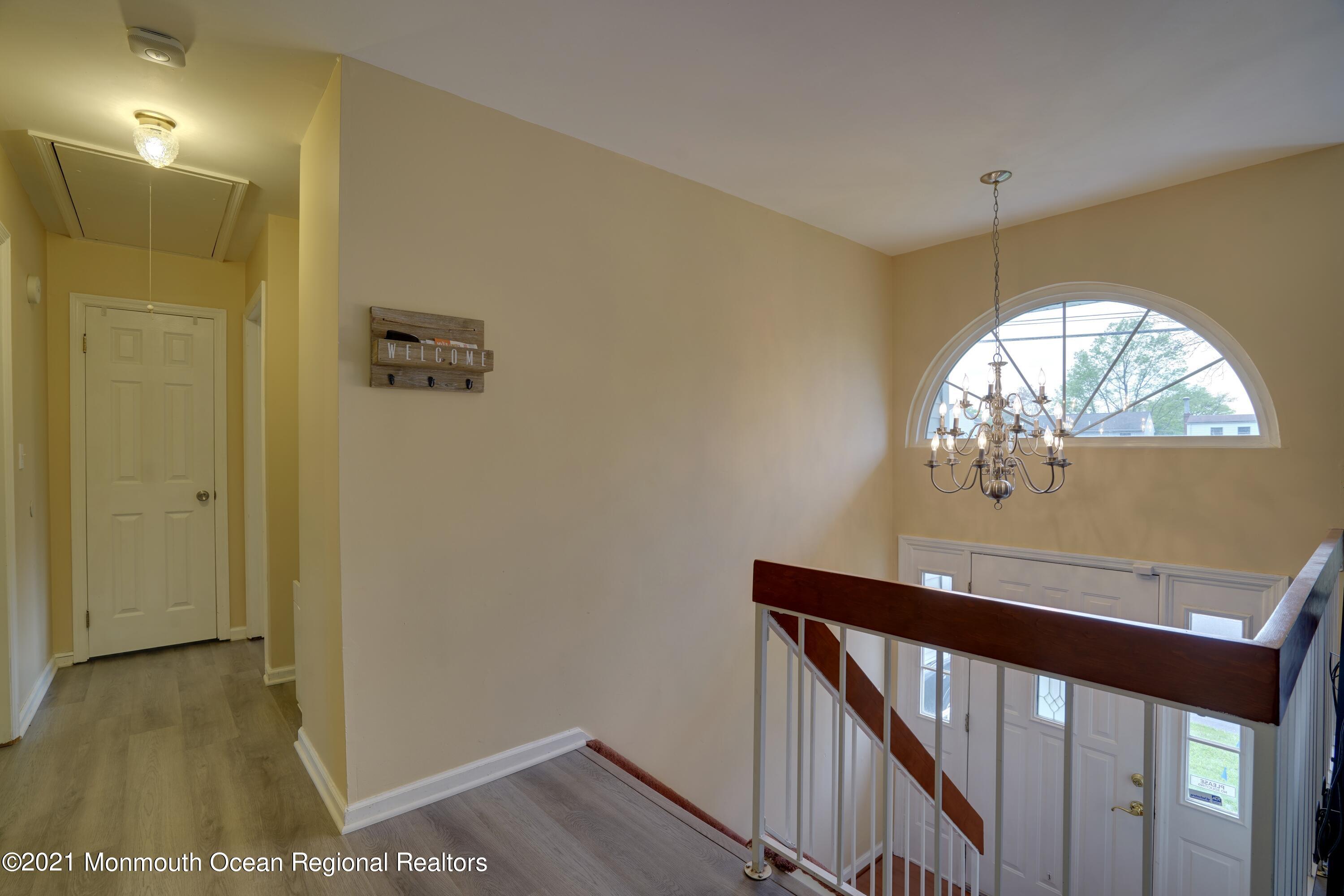 217 County Road Cliffwood, NJ 07721 - Photo 4 of 27 a view of entryway with wooden floor