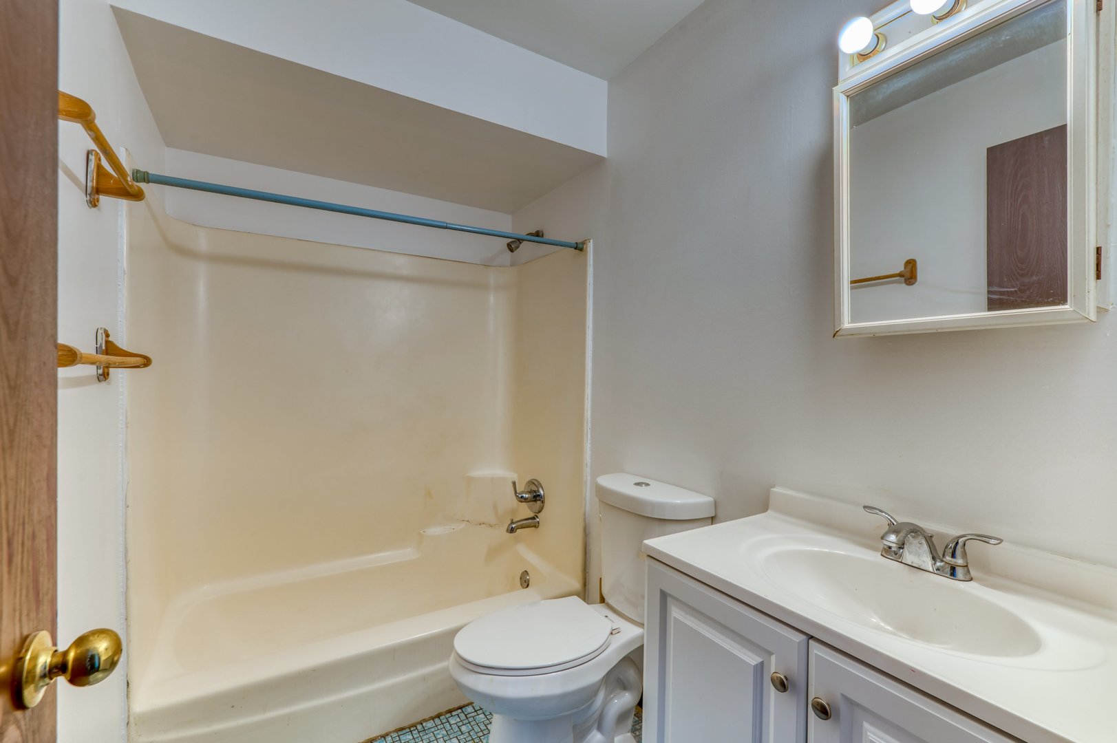 1713 Nelson Road, Unit 12 New Lenox, IL 60451 - Photo 11 of 14 a bathroom with a sink toilet and shower