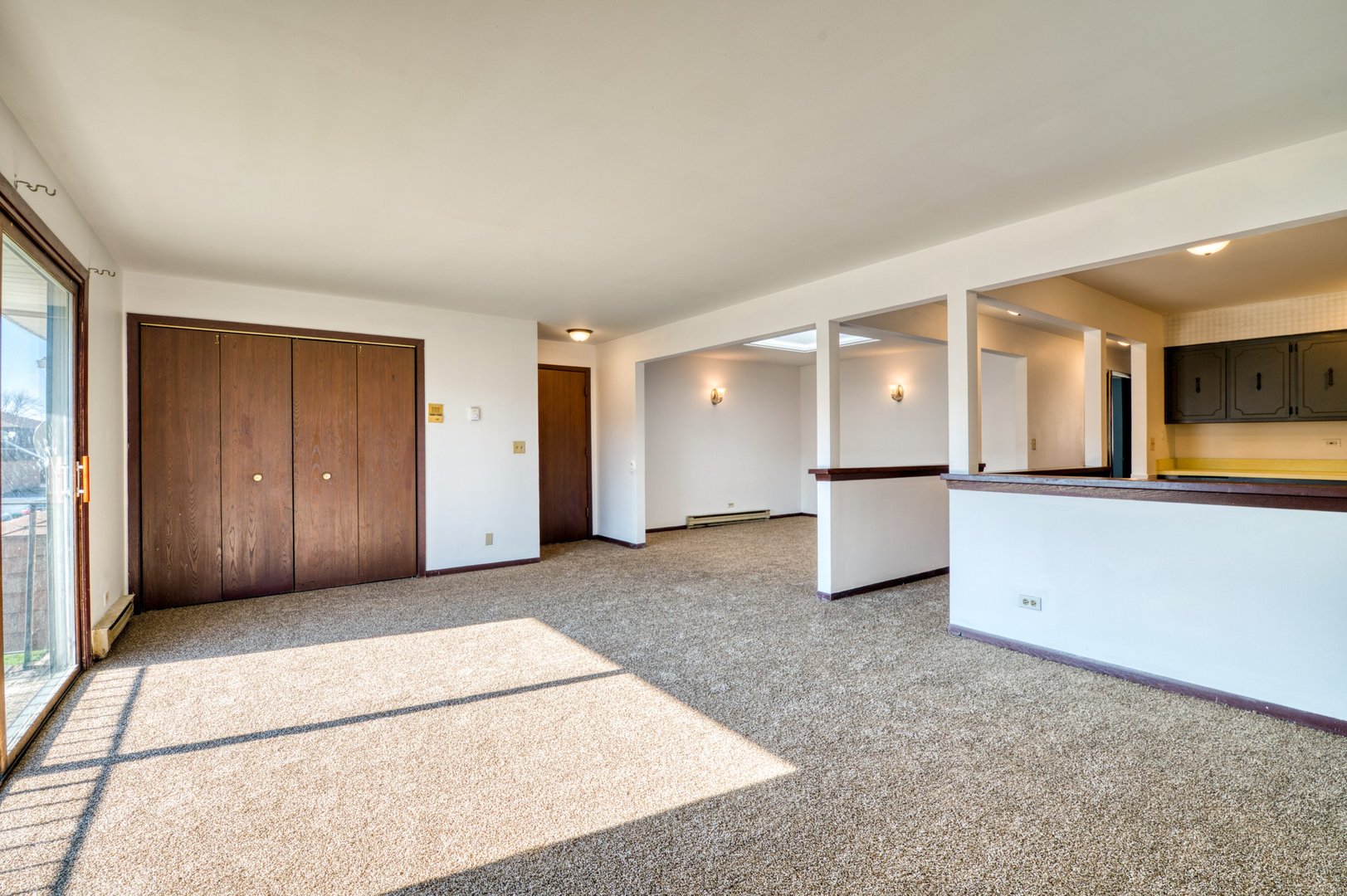 1713 Nelson Road, Unit 12 New Lenox, IL 60451 - Photo 5 of 14 a view of empty room with a kitchen