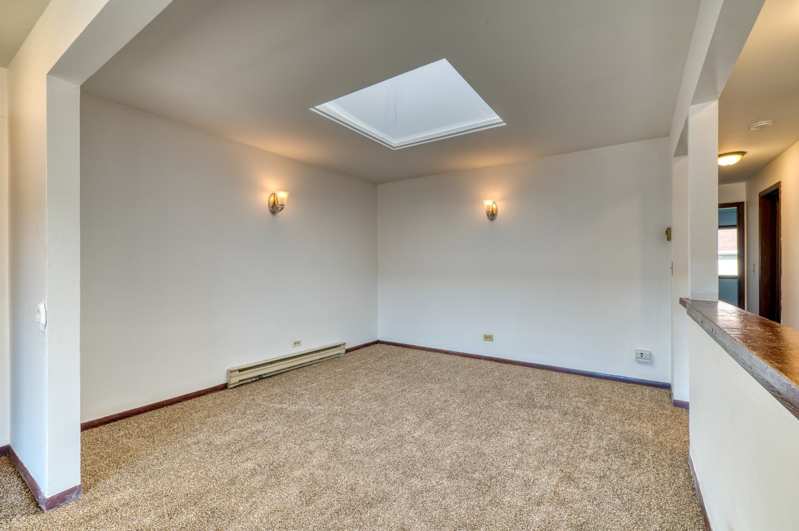 1713 Nelson Road, Unit 12 New Lenox, IL 60451 - Photo 6 of 14 an empty room with a fireplace and painted walls
