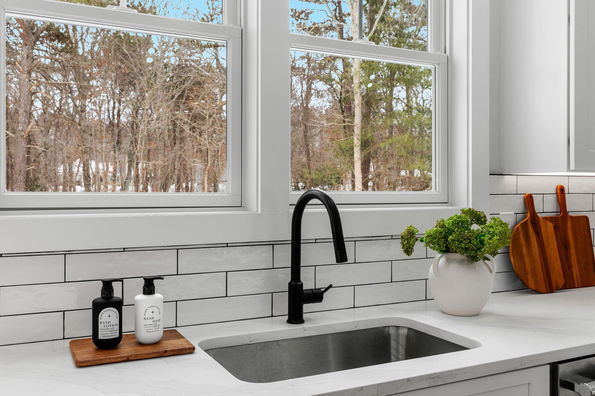 28 Spinnaker Street Sandwich, MA 02563 - Photo 19 of 55 a kitchen with a sink and a window