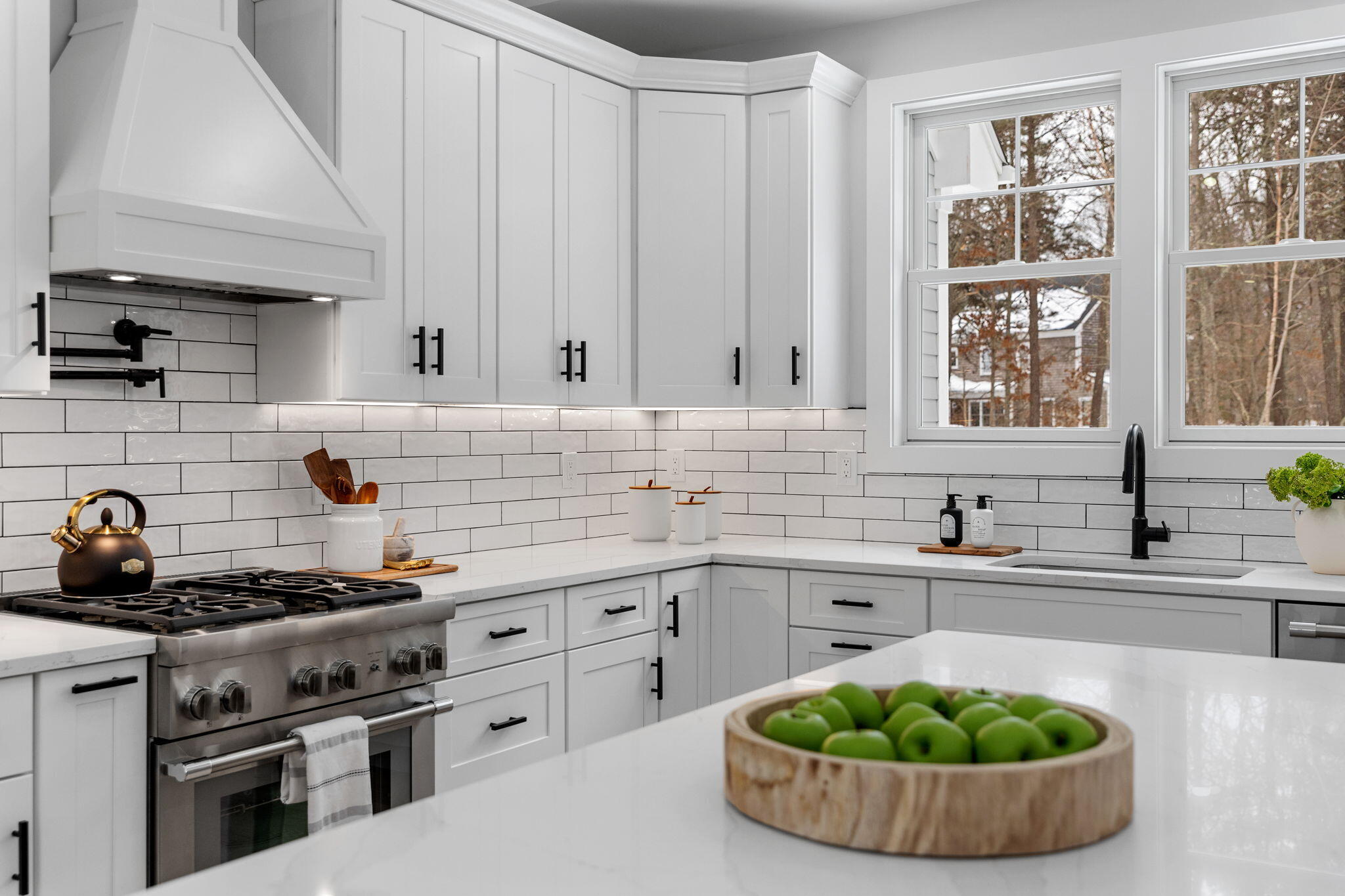 28 Spinnaker Street Sandwich, MA 02563 - Photo 21 of 55 a kitchen with stainless steel appliances a sink a stove and a window
