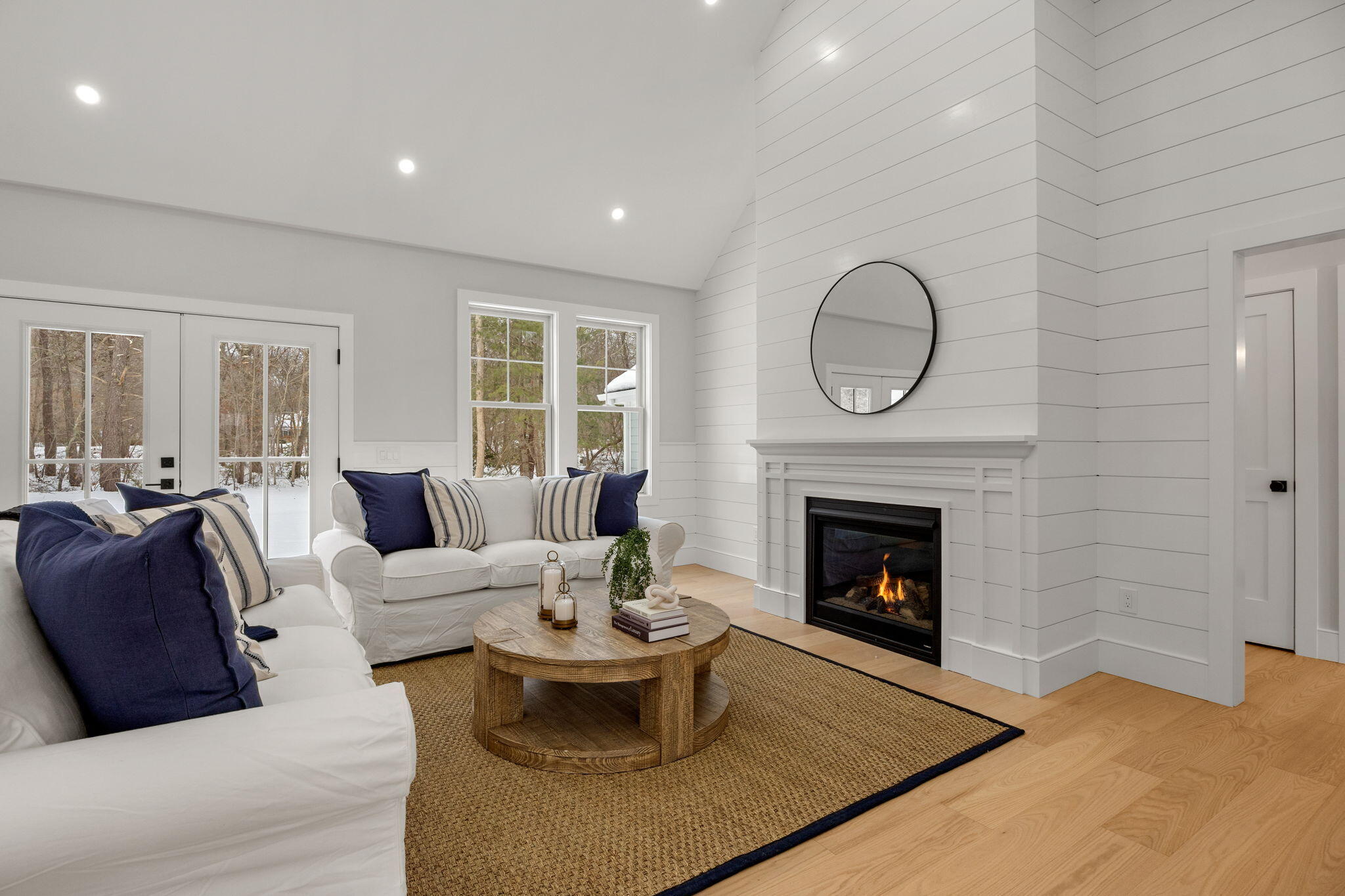 28 Spinnaker Street Sandwich, MA 02563 - Photo 25 of 55 a living room with furniture and a fireplace