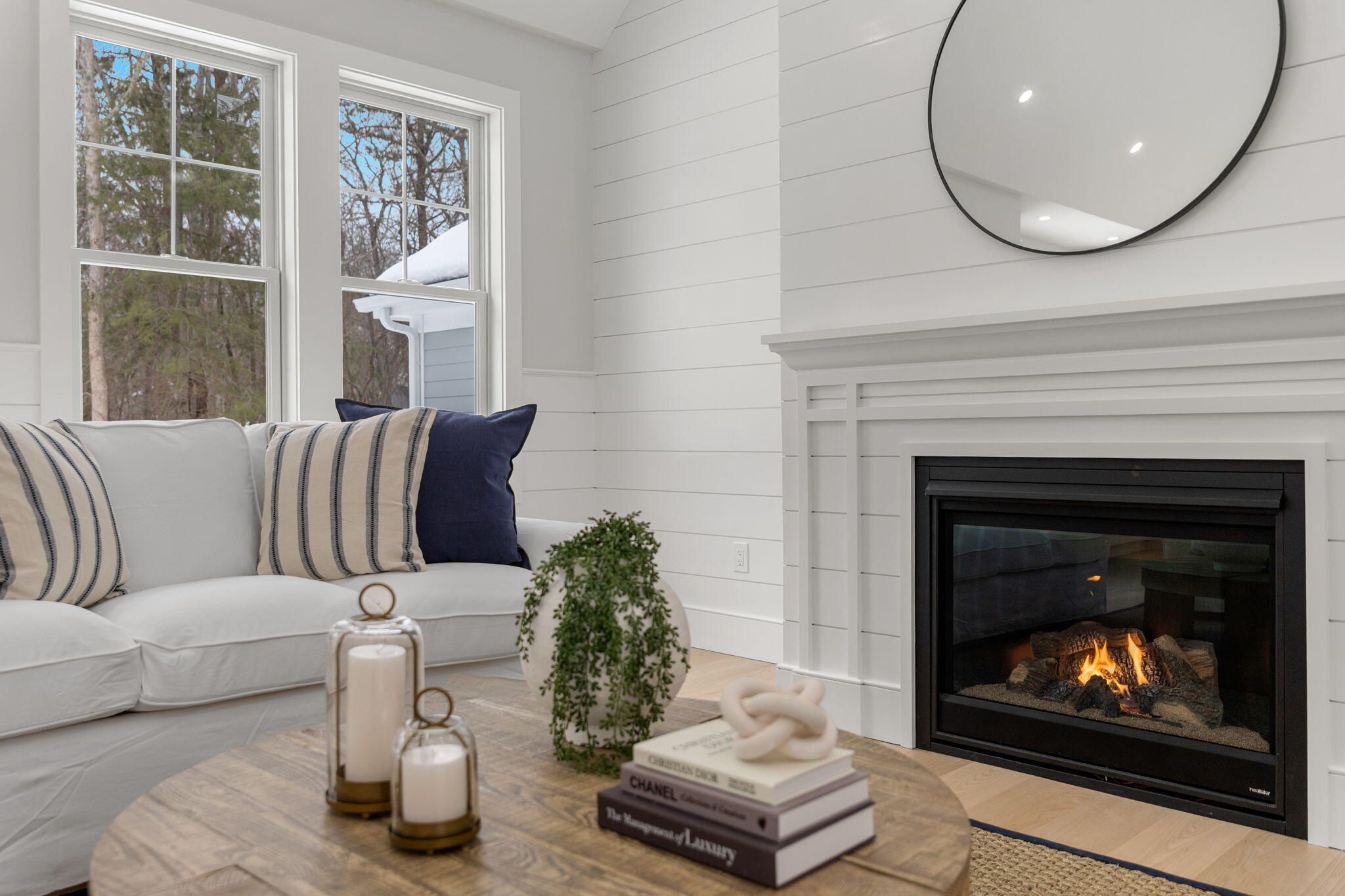 28 Spinnaker Street Sandwich, MA 02563 - Photo 27 of 55 a living room with furniture and a fireplace