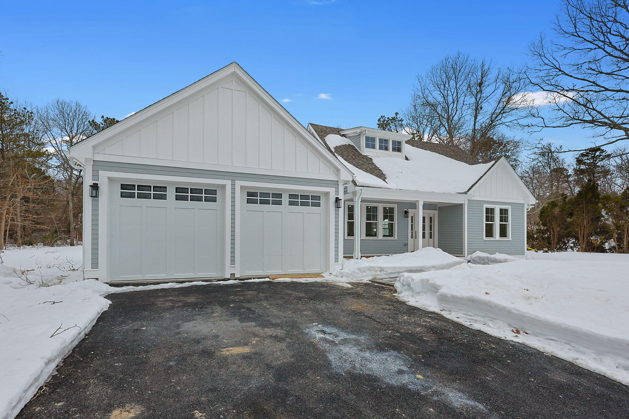 28 Spinnaker Street Sandwich, MA 02563 - Photo 3 of 55 a front view of a house with a yard