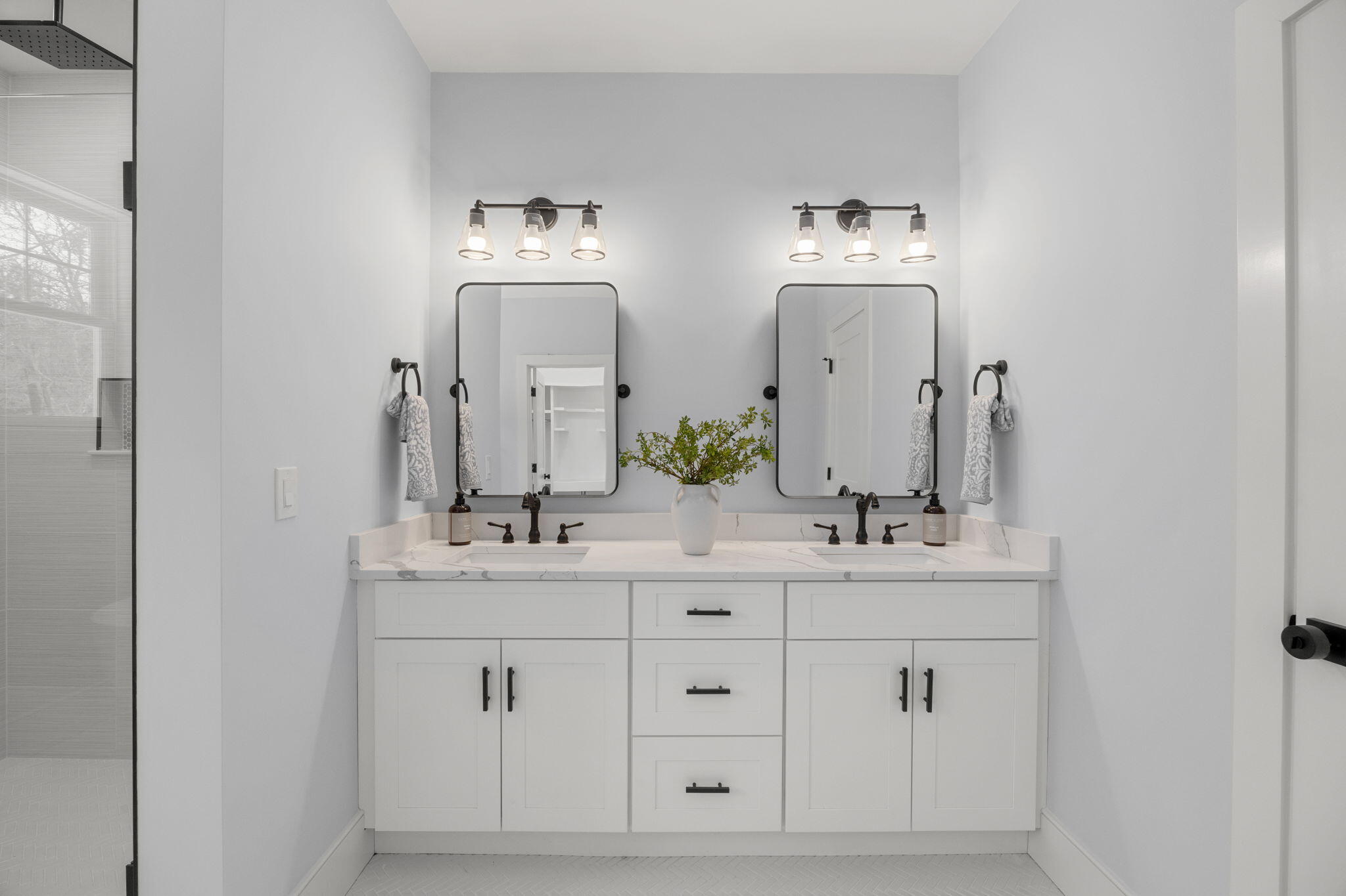 28 Spinnaker Street Sandwich, MA 02563 - Photo 31 of 55 a bathroom with double sink and a mirror