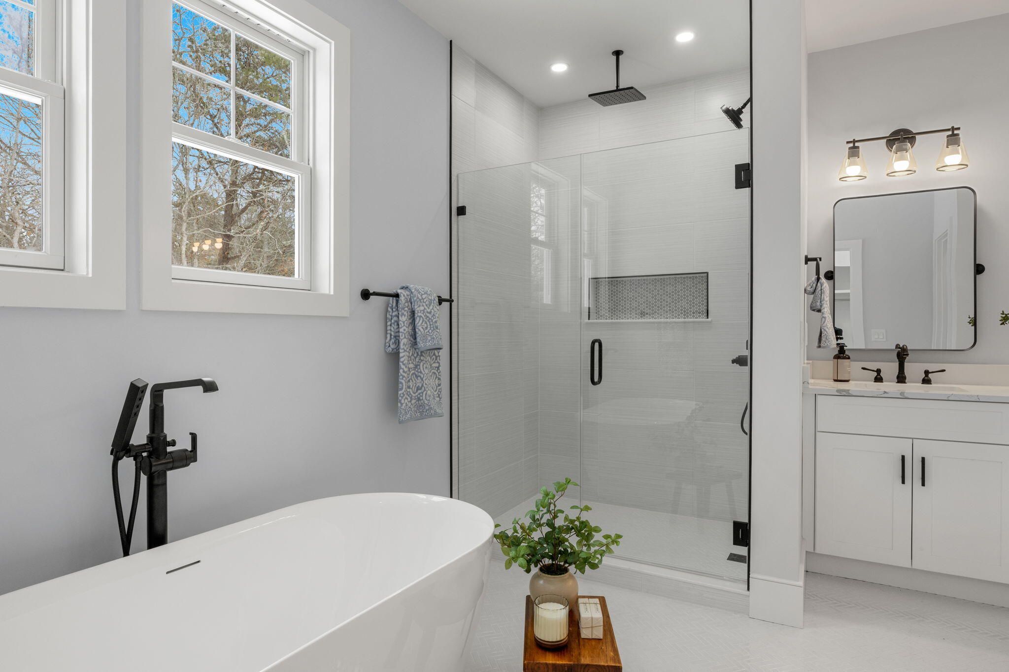 28 Spinnaker Street Sandwich, MA 02563 - Photo 34 of 55 a bathroom with a tub sink and mirror