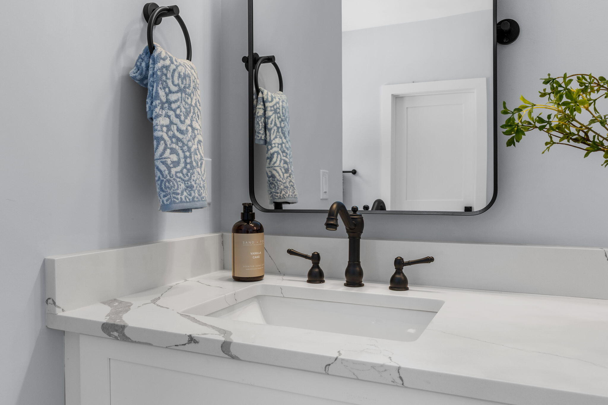 28 Spinnaker Street Sandwich, MA 02563 - Photo 36 of 55 a bathroom with a sink and a mirror