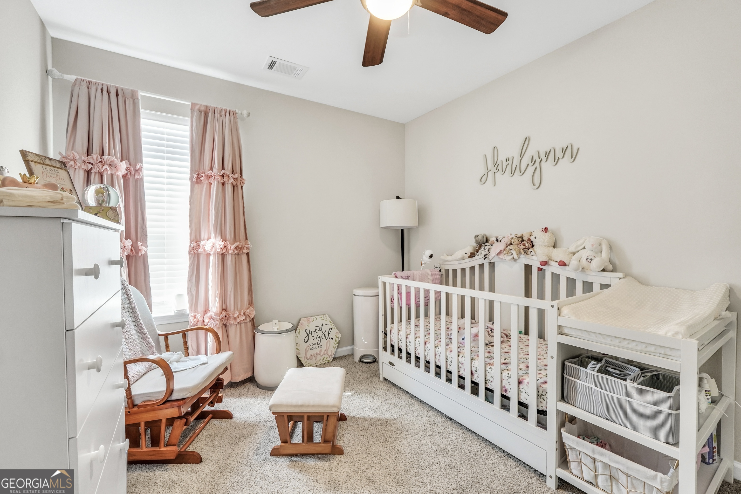 117 Charleston Lane Milner, GA 30257 - Photo 23 of 34 a bedroom with furniture and windows