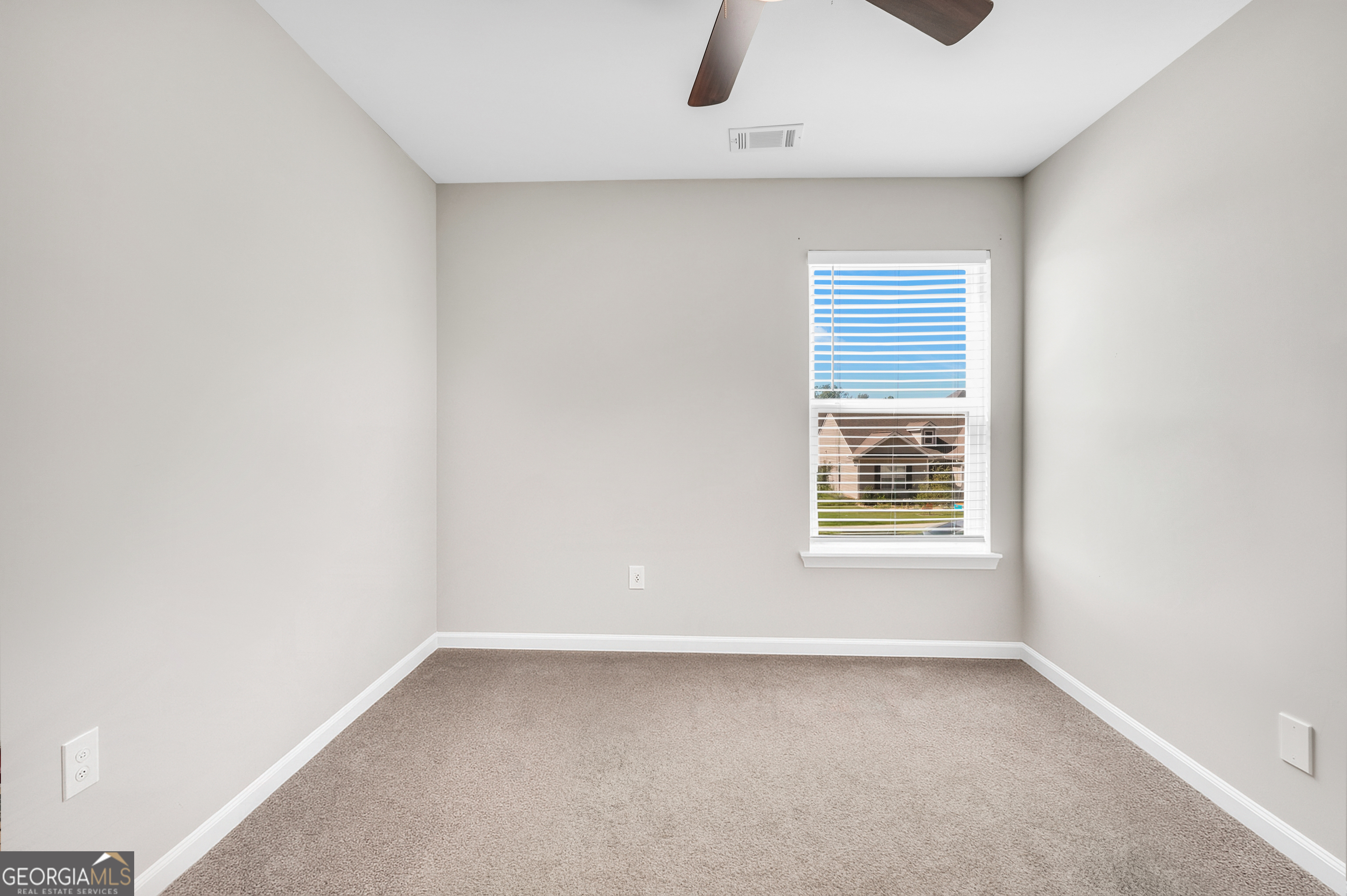 117 Charleston Lane Milner, GA 30257 - Photo 26 of 34 an empty room with a window