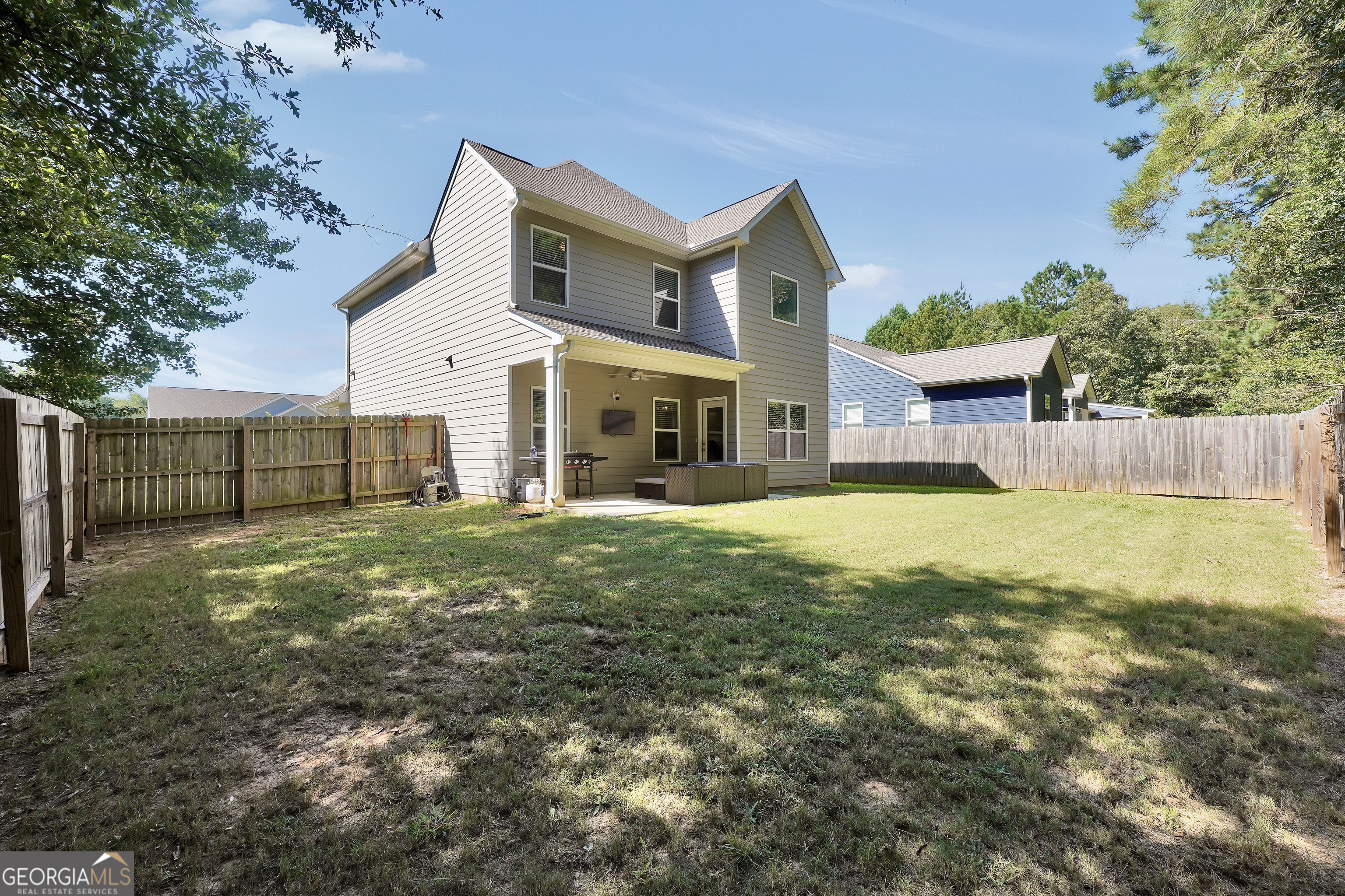 117 Charleston Lane Milner, GA 30257 - Photo 33 of 34 a front view of a house with a yard