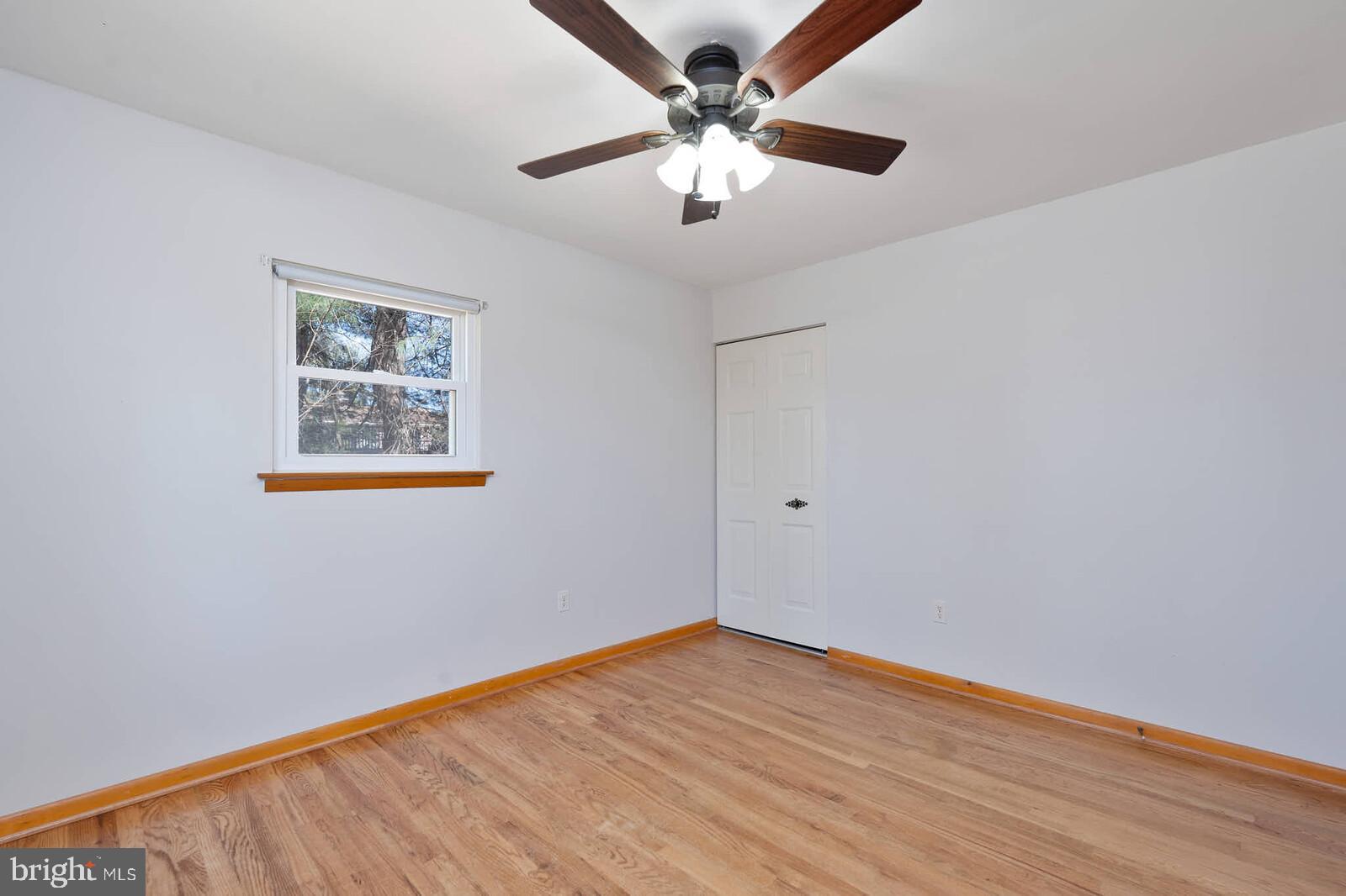 4921 Buffalo Road Mount Airy, MD 21771 - Photo 15 of 36 a view of an empty room with wooden floor