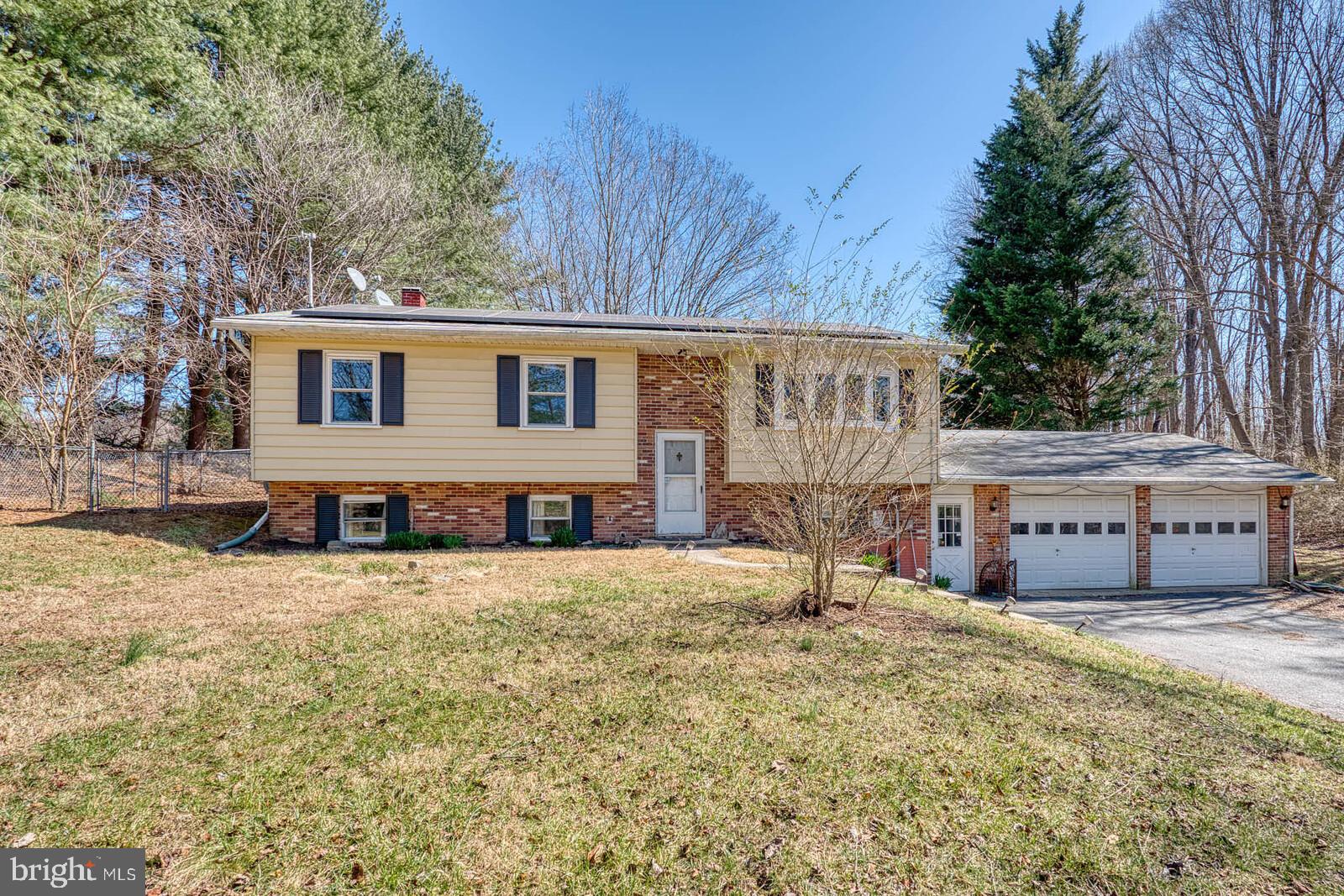 4921 Buffalo Road Mount Airy, MD 21771 - Photo 2 of 36 front view of a house with a yard