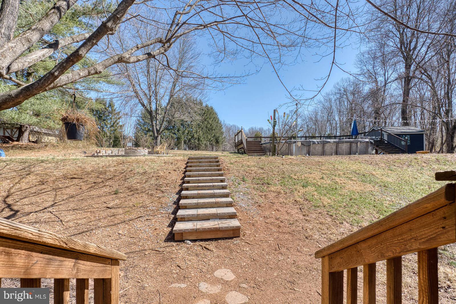 4921 Buffalo Road Mount Airy, MD 21771 - Photo 26 of 36 a view of a yard with trees