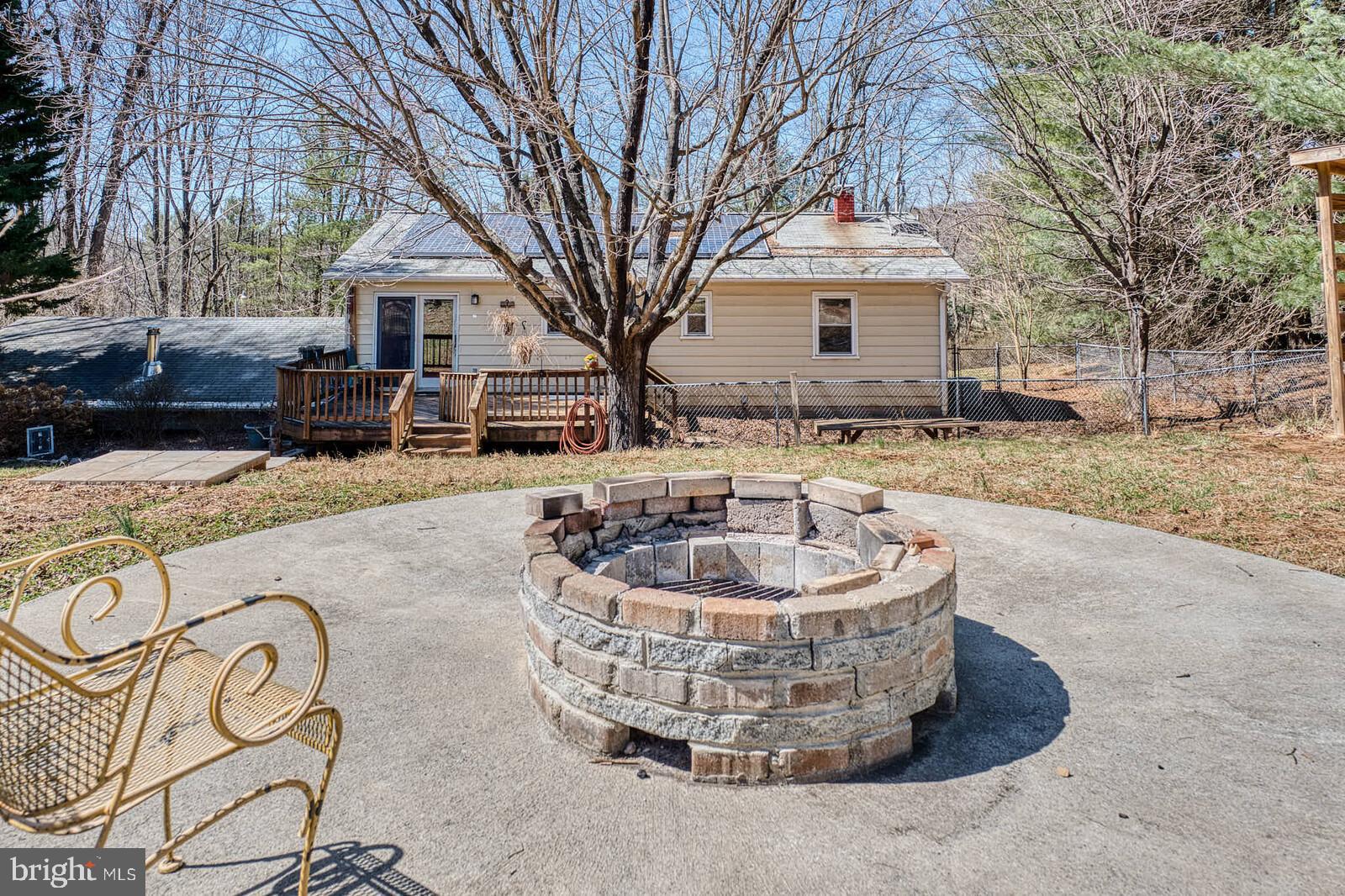 4921 Buffalo Road Mount Airy, MD 21771 - Photo 34 of 36 a front view of a house with a yard and seating space
