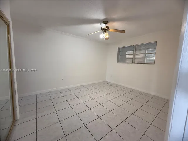 a bathroom with a sink a toilet a mirror and vanity