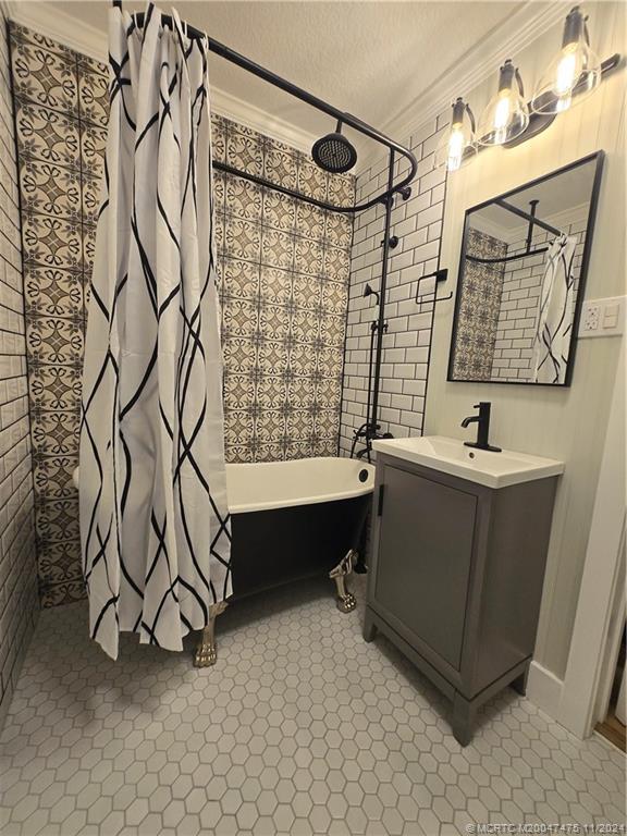 420 Southwest 7th Street Stuart, FL 34994 - Photo 13 of 17 a bathroom with a sink and a mirror