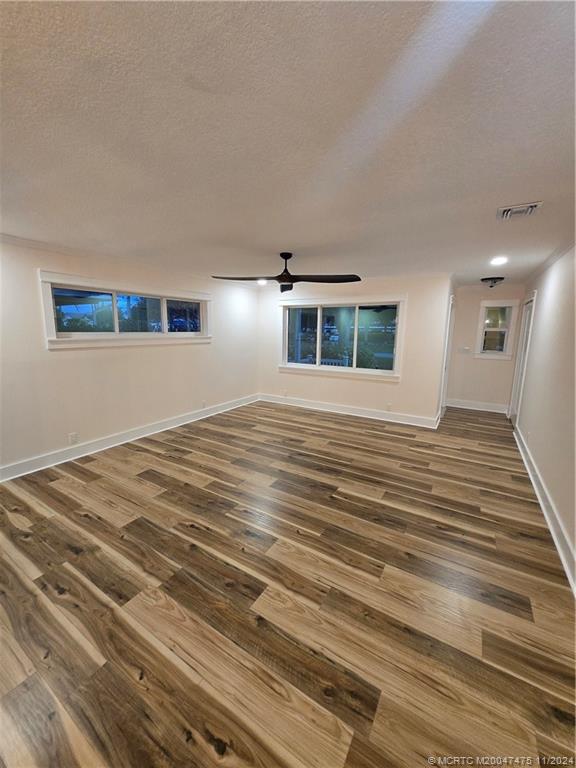 420 Southwest 7th Street Stuart, FL 34994 - Photo 5 of 17 a view of a livingroom with kitchen furniture