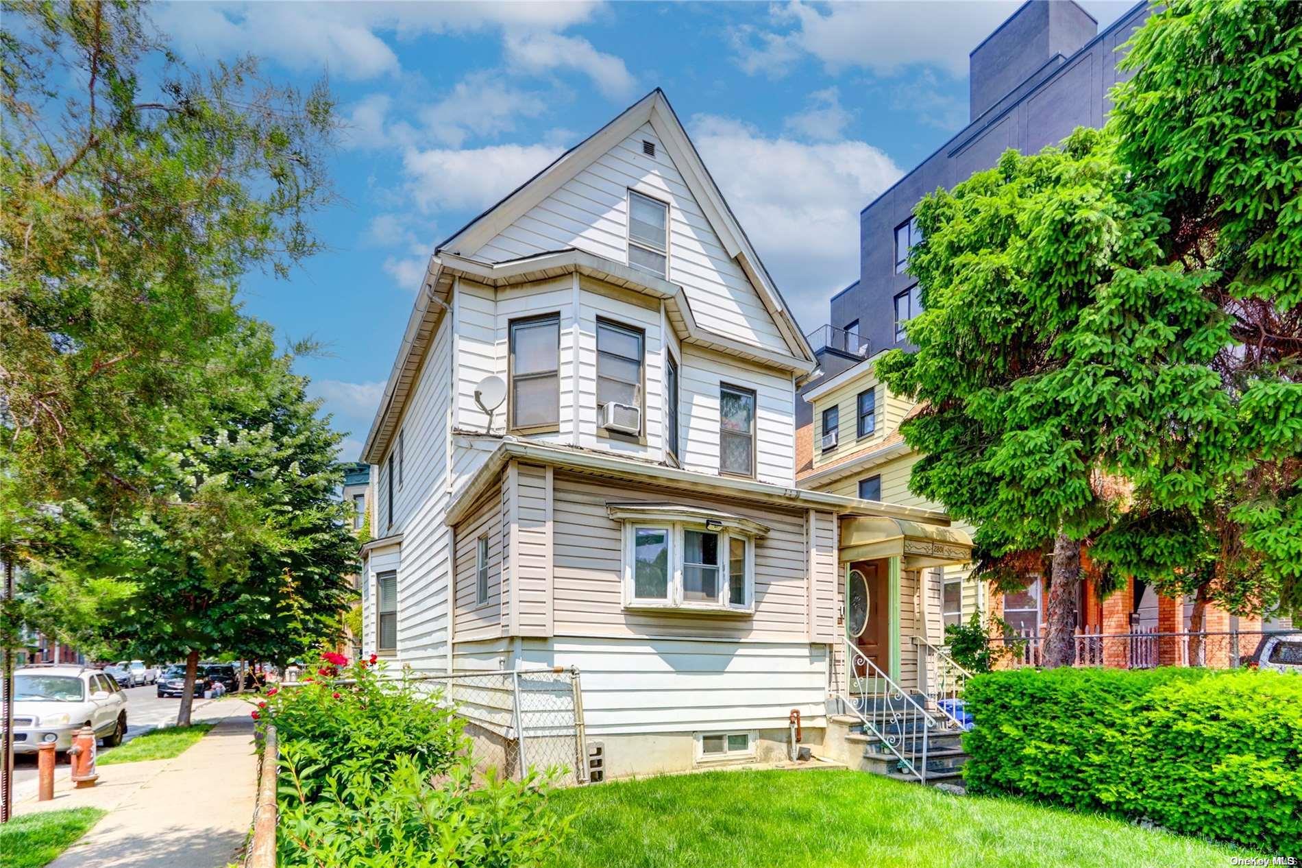 2801 Clarendon Road Brooklyn, NY 11226 - Photo 1 of 1 a front view of a house with a yard
