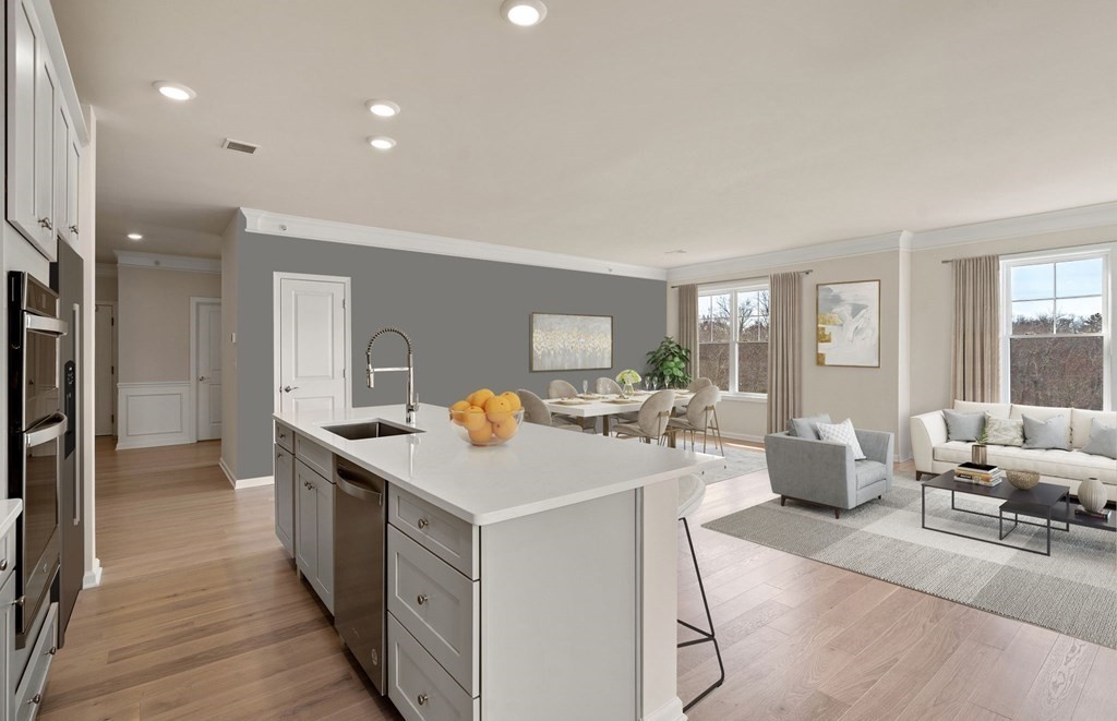 2 Stratton Drive, Unit 305 Woburn, MA 01801 - Photo 2 of 15 a view of a kitchen with a stove a refrigerator and wooden floor