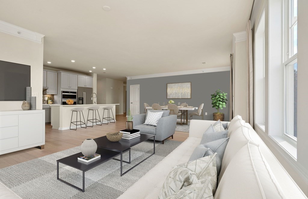 2 Stratton Drive, Unit 305 Woburn, MA 01801 - Photo 5 of 15 a living room with furniture and a large window