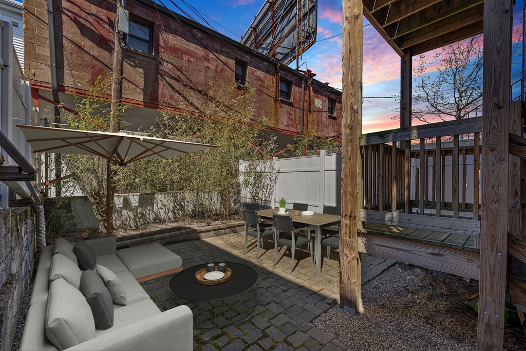 110 Chelsea Street, Unit 1 Boston, MA 02128 - Photo 10 of 12 a building outdoor space with patio furniture