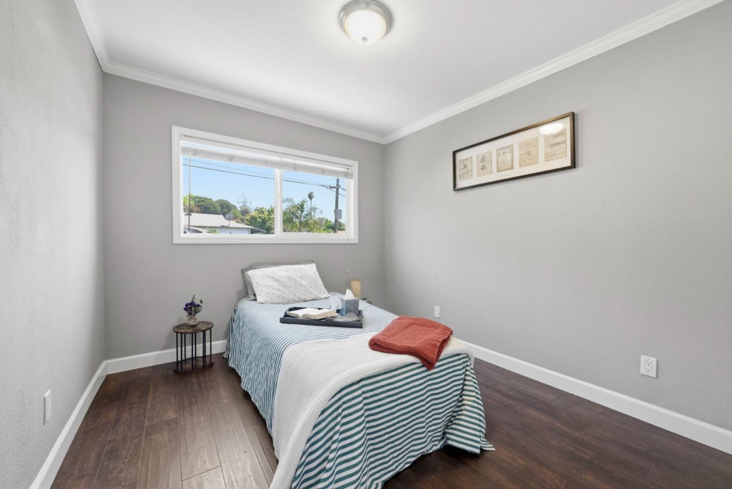 2793 Ruff Court Pinole, CA 94564 - Photo 18 of 53 a bedroom with a bed and a window