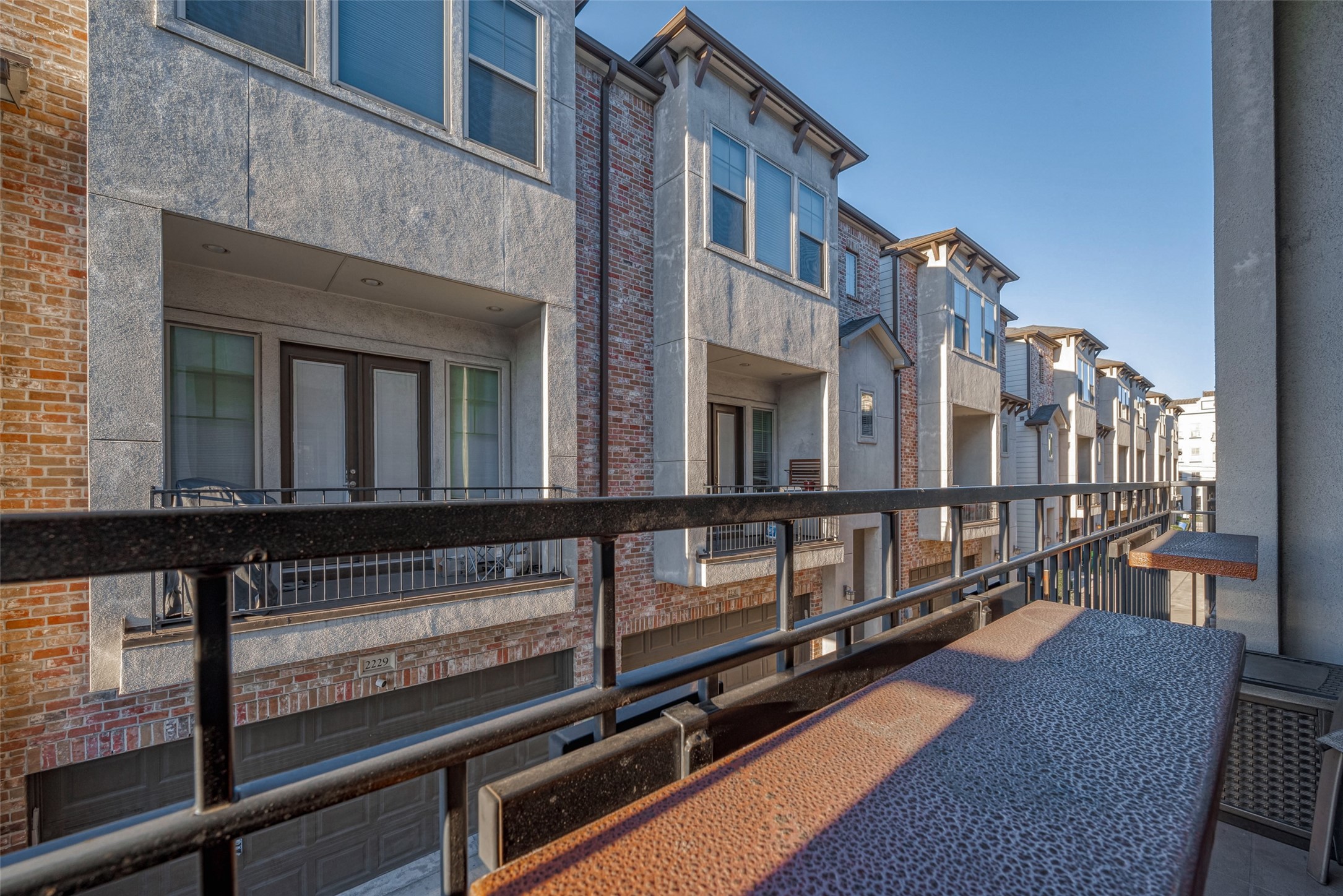 2227 Chenevert Street Houston, TX 77003 - Photo 14 of 24 a view of a building from a balcony