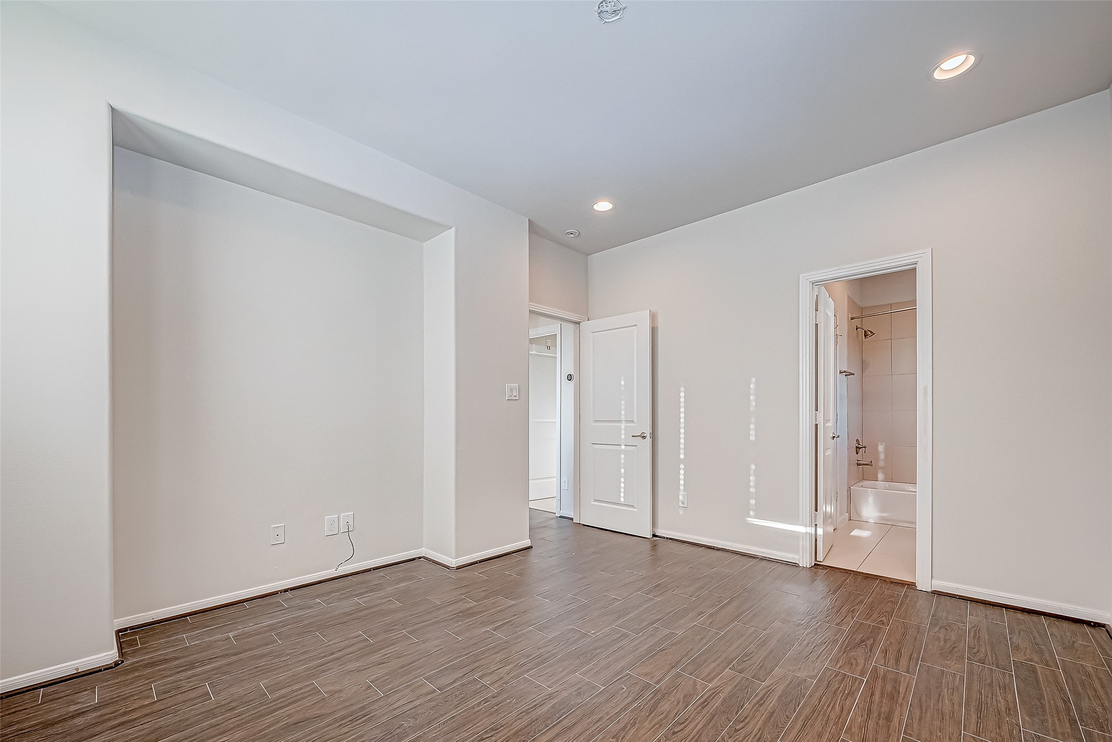 2227 Chenevert Street Houston, TX 77003 - Photo 20 of 24 a view of an empty room with wooden floor
