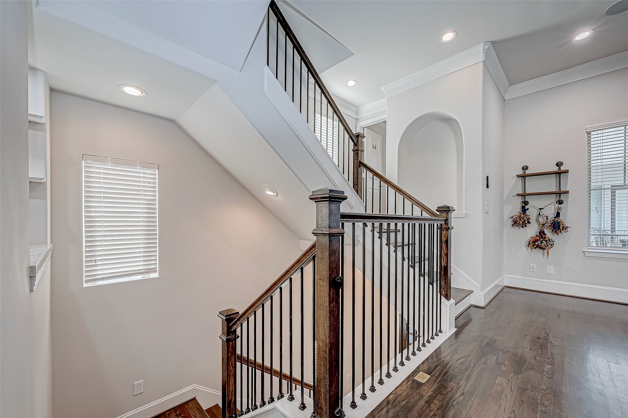 2227 Chenevert Street Houston, TX 77003 - Photo 4 of 24 a view of a hallway with wooden floor and entryway