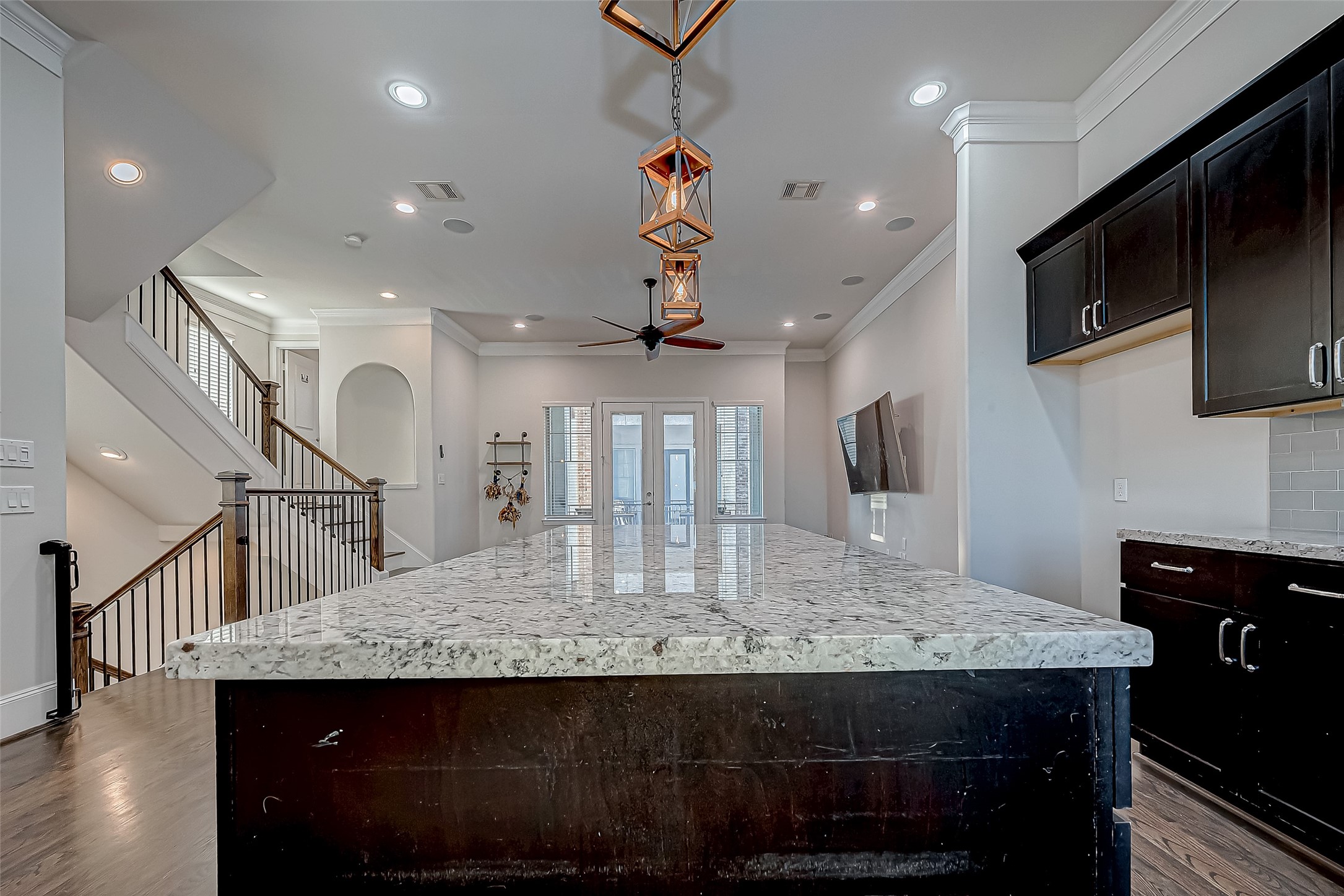 2227 Chenevert Street Houston, TX 77003 - Photo 6 of 24 a view of kitchen island with granite countertop stainless steel appliances lots of counter space