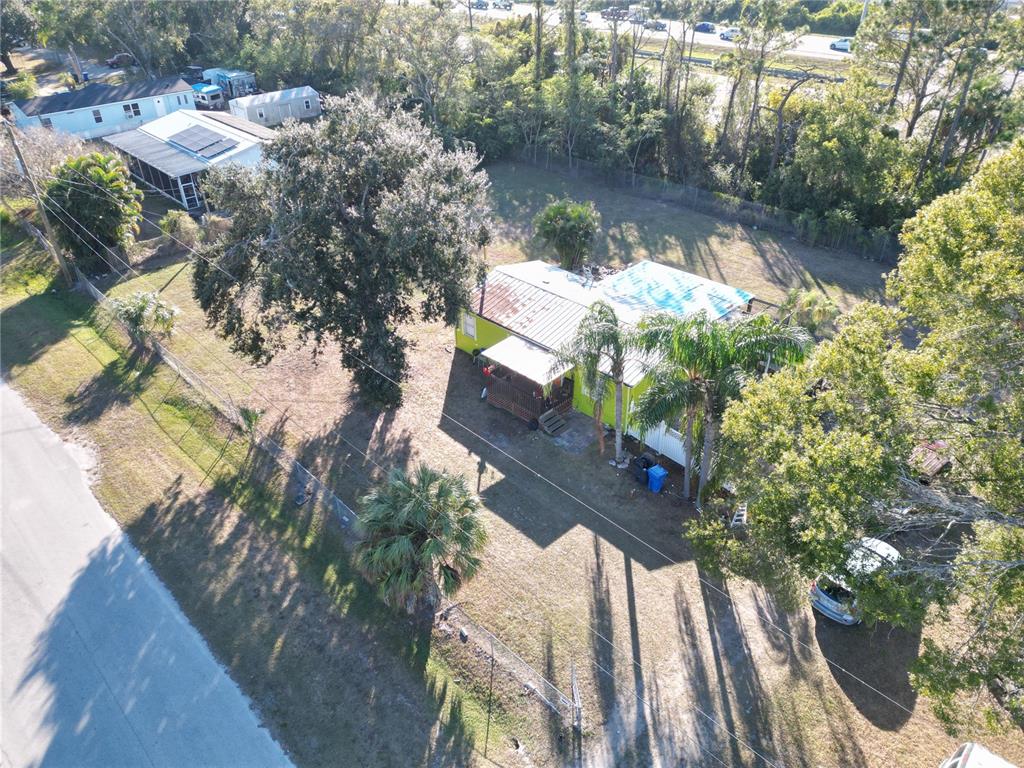 8013 Formby Street Riverview, FL 33578 - Photo 6 of 7 a view of a lake with a yard