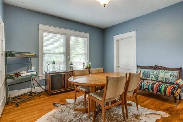 a view of a livingroom with furniture and a window