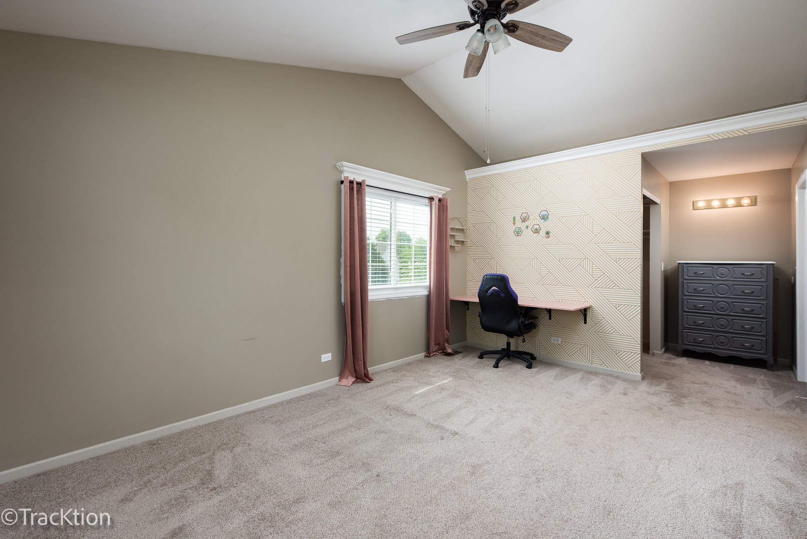122 Creston Circle, Unit 122 Aurora, IL 60504 - Photo 12 of 22 a living room with furniture and a ceiling fan