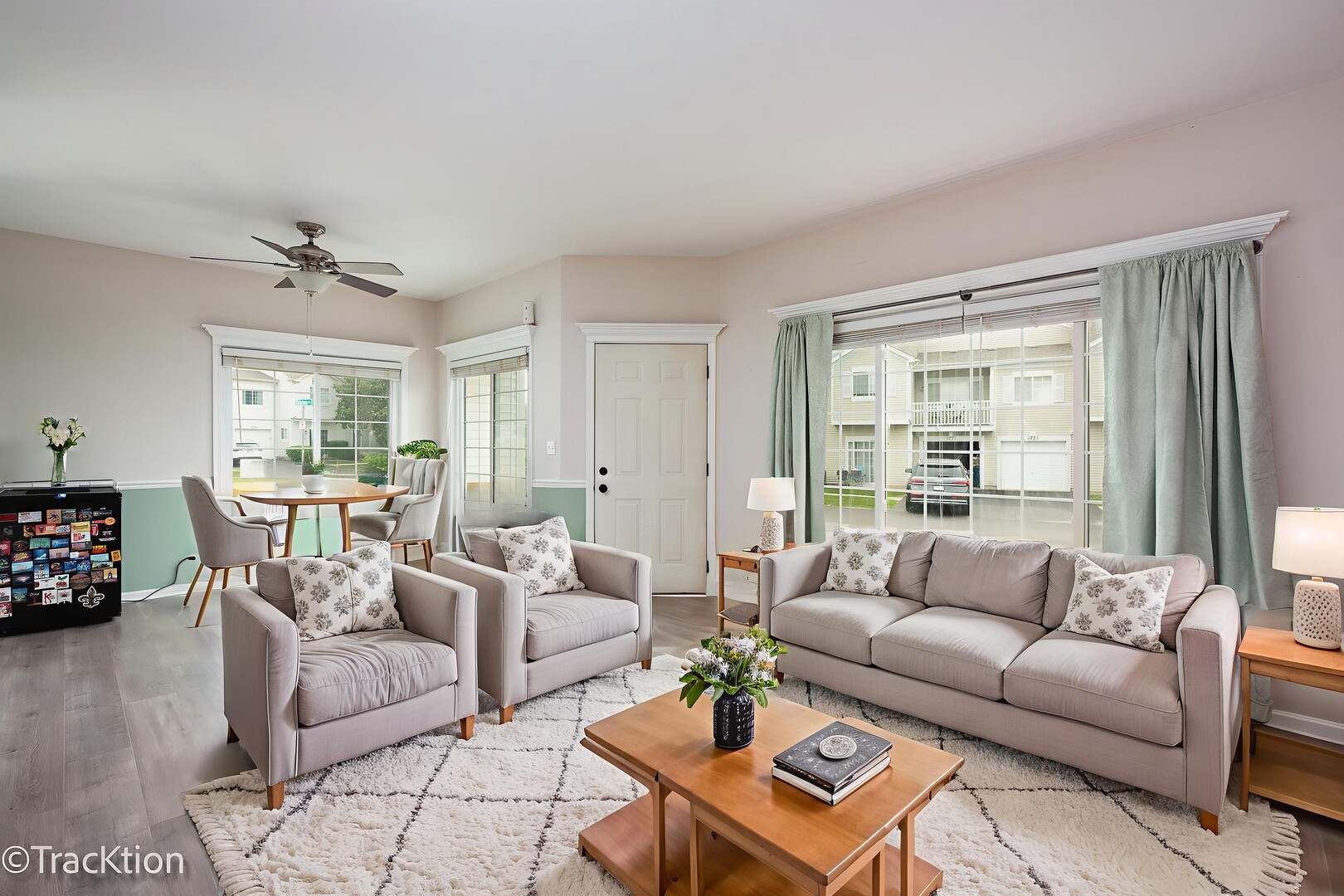 122 Creston Circle, Unit 122 Aurora, IL 60504 - Photo 2 of 22 a living room with furniture and a large window