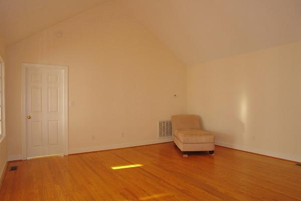 104 Claybrook Court Blue Ridge, VA 24064 - Photo 14 of 74 a view of an empty room and wooden floor
