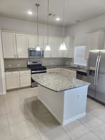 a view of a room with lots of white walls