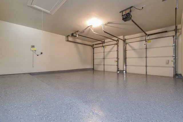 a view of a house with backyard and garden