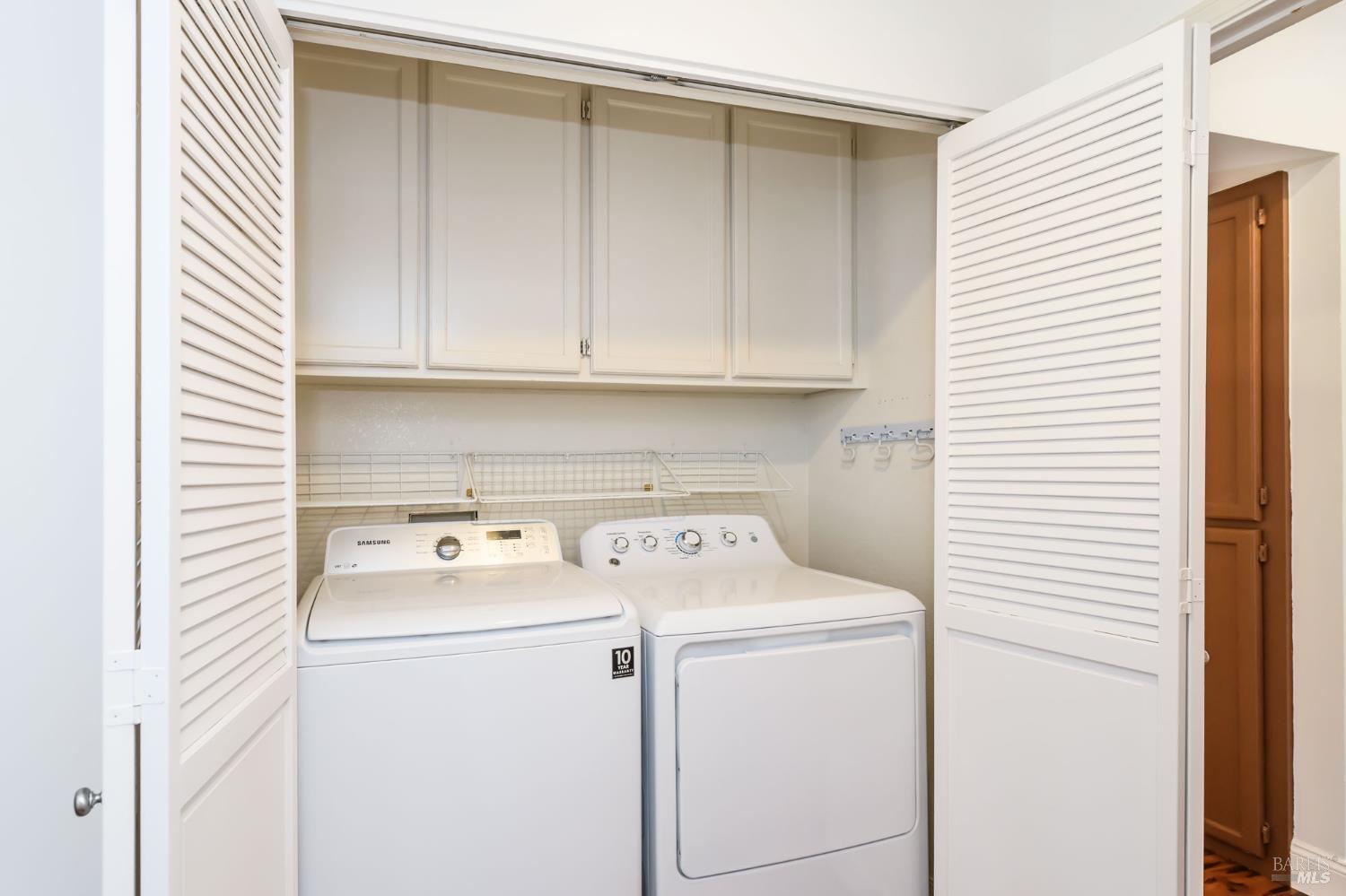 8 Mariners Circle San Rafael, CA 94903 - Photo 16 of 34 a utility room with dryer and washer