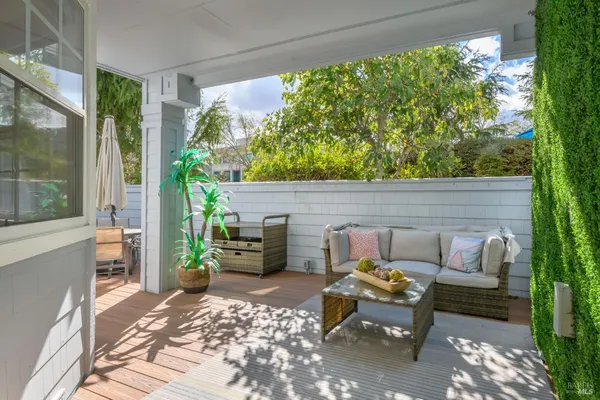 a outdoor living space with furniture and garden view