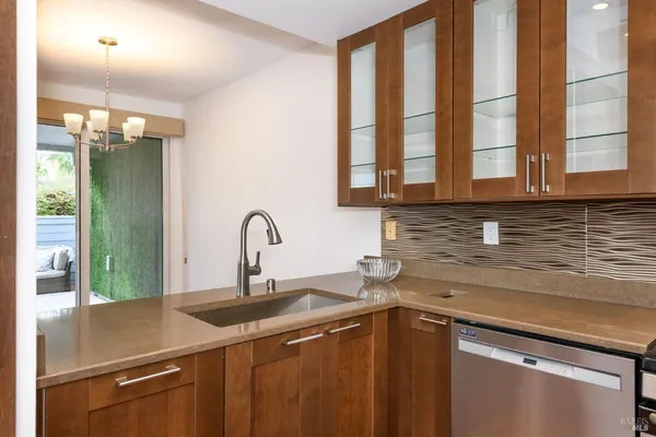a kitchen with a sink and a window
