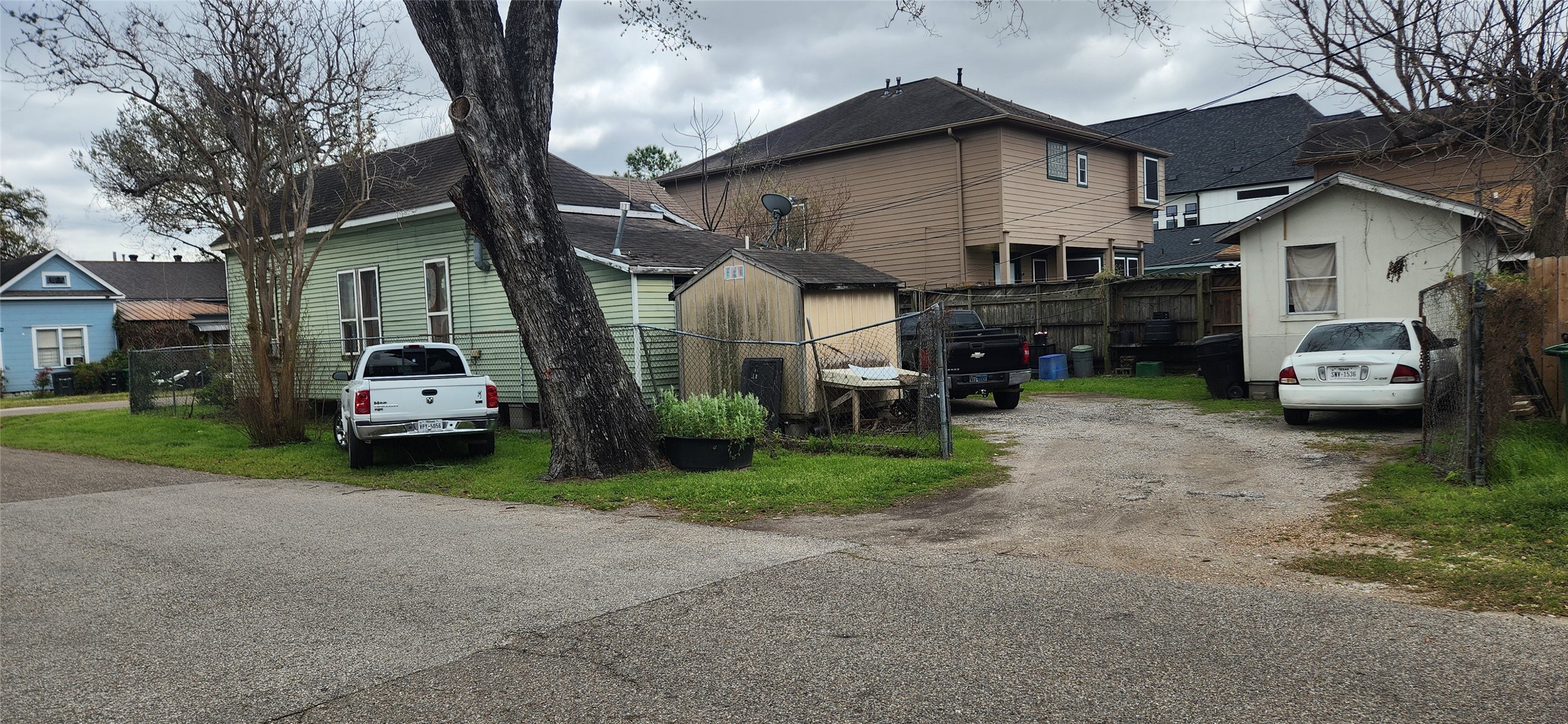 211 Tabor Street Houston, TX 77009 - Photo 10 of 11 a car parked in front of a house