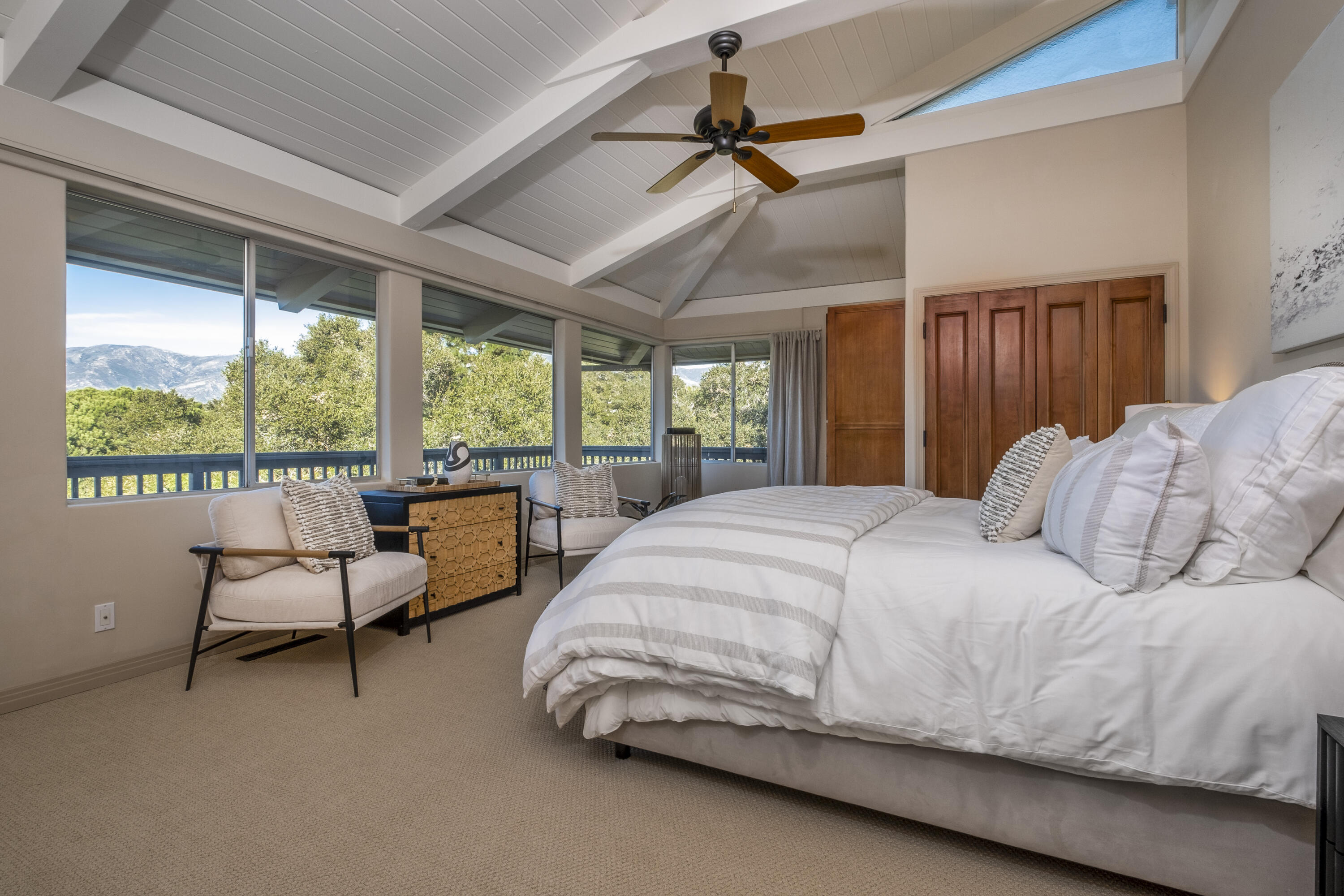 985 Monte Drive Santa Barbara, CA 93110 - Photo 10 of 29 a bed sitting in a spacious bedroom next to a window