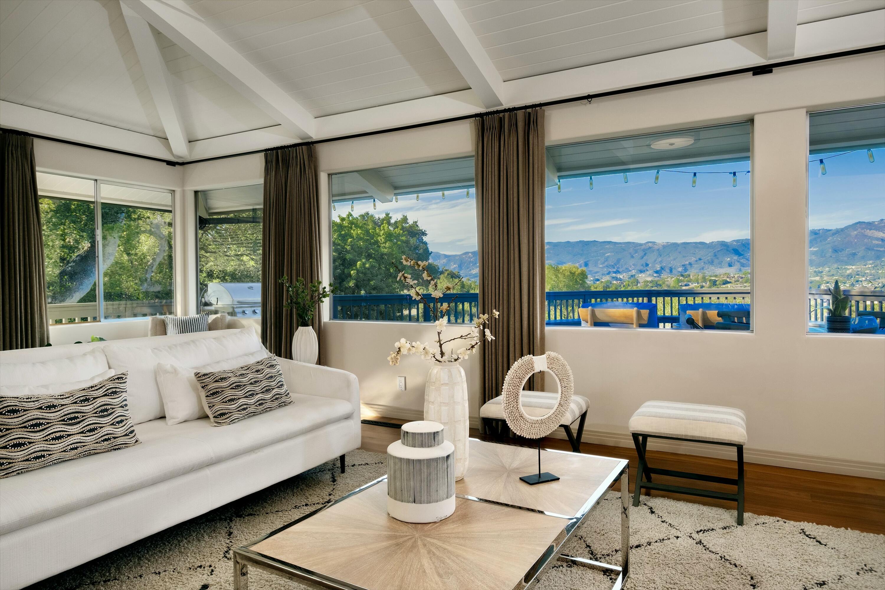 985 Monte Drive Santa Barbara, CA 93110 - Photo 3 of 29 a living room with furniture and a large window