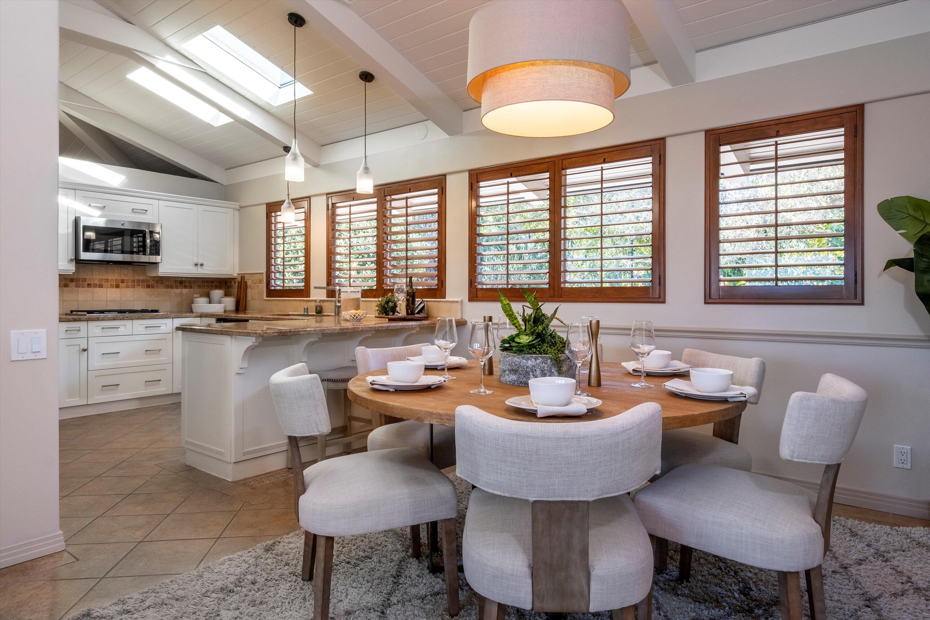 985 Monte Drive Santa Barbara, CA 93110 - Photo 9 of 29 a large kitchen with a table and chairs