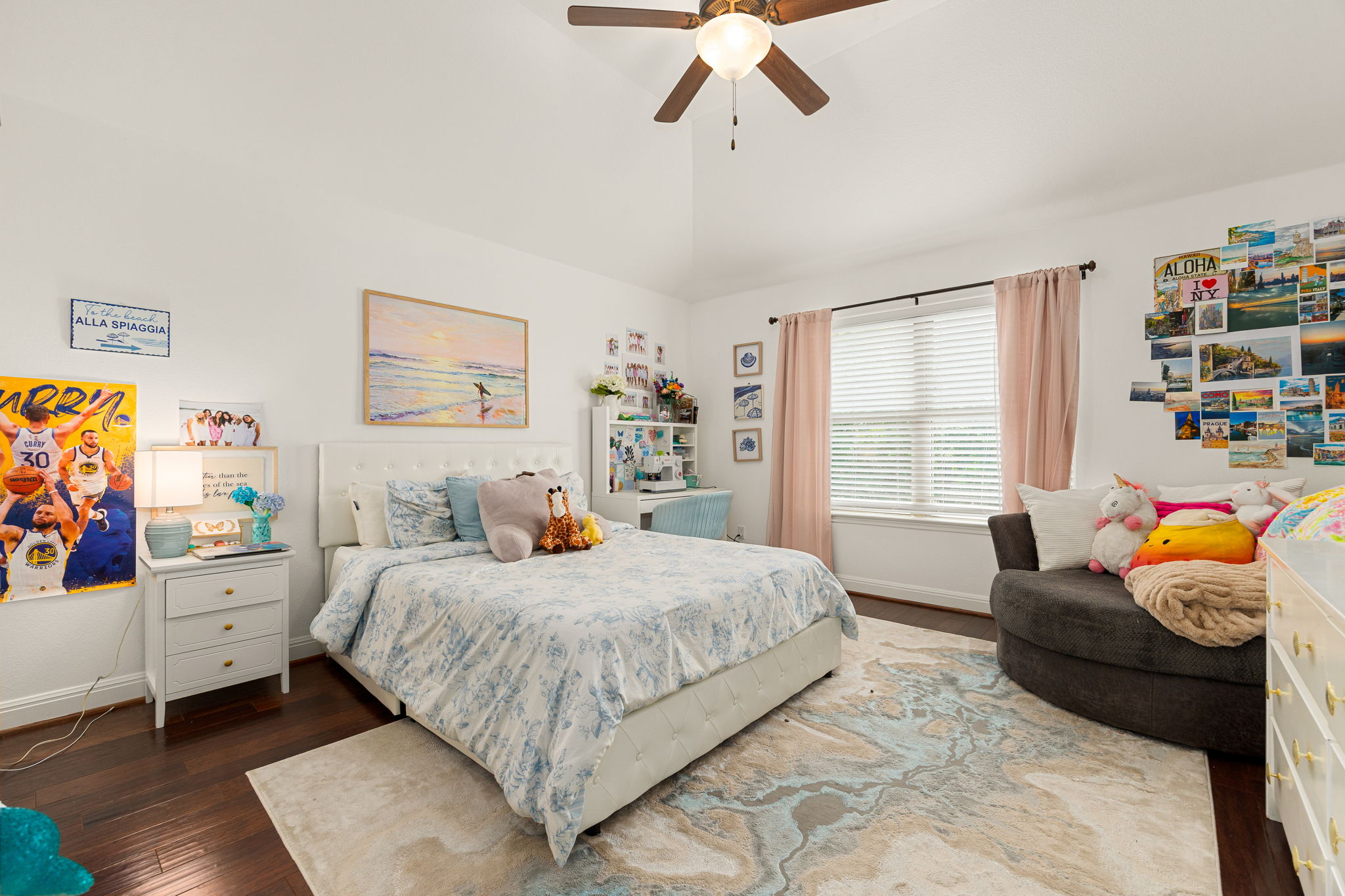 225 Pettigrew Path Buda, TX 78610 - Photo 25 of 38 a bedroom with a bed and a window