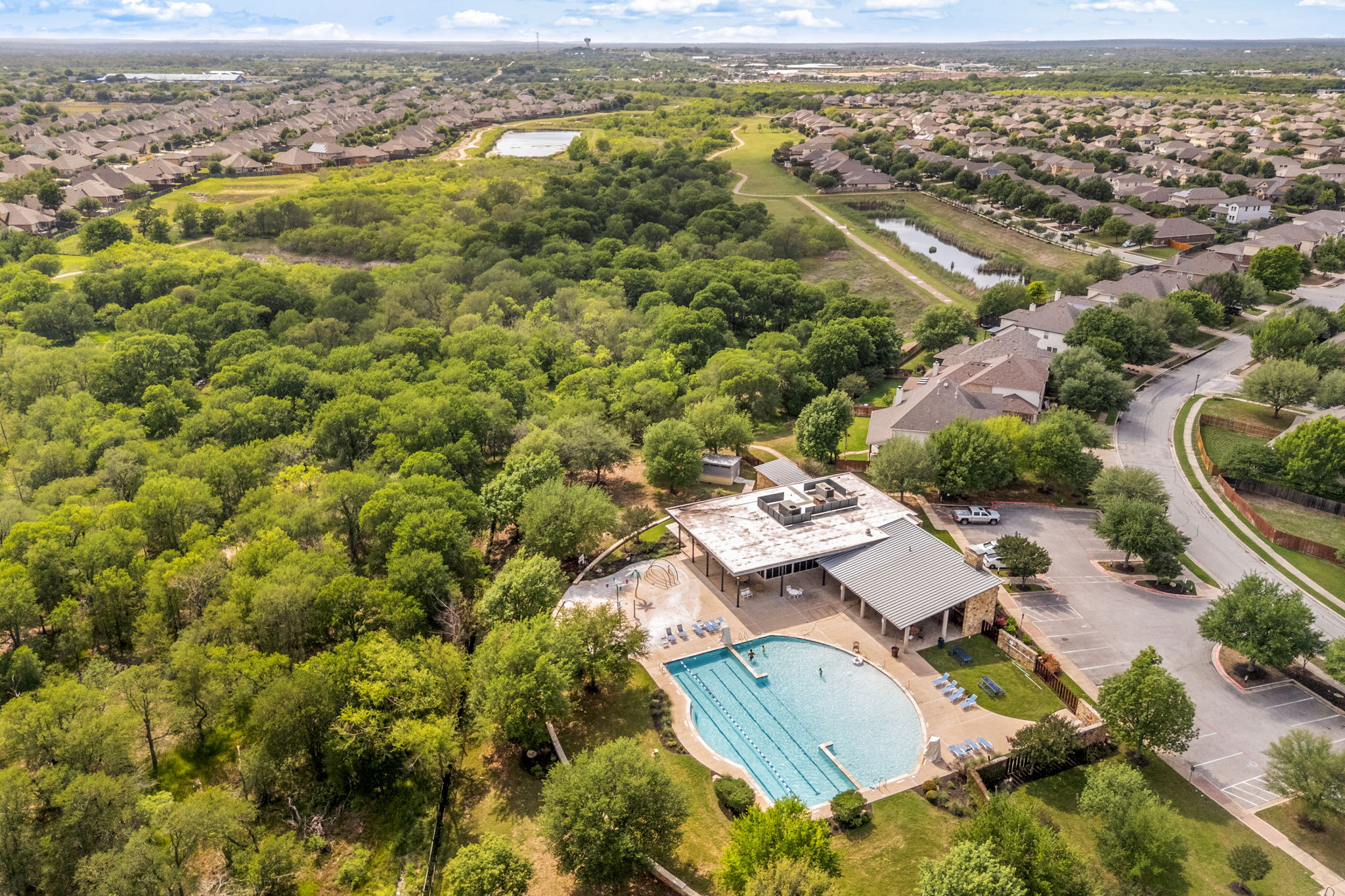 225 Pettigrew Path Buda, TX 78610 - Photo 36 of 38 an aerial view of residential houses with outdoor space